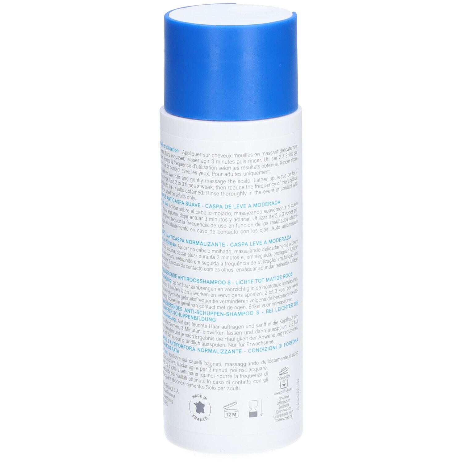 Achterkant van een witte fles met blauwe dop. Meertalige tekst. Gemaakt in Frankrijk.