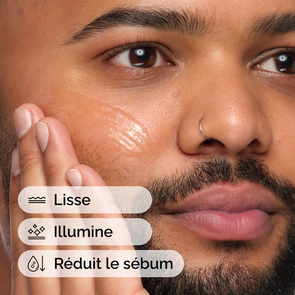 Homme appliquant sérum. Icônes: lisse, illumine, réduit le sébum.