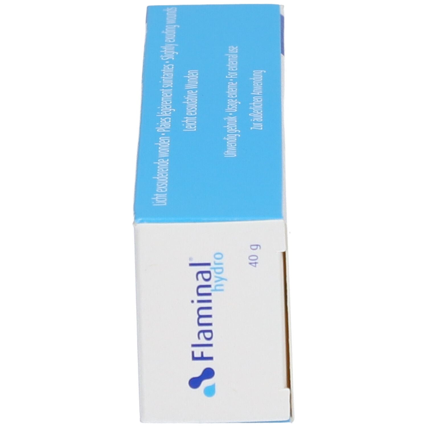 Boîte, vue latérale. Inscription bleu et blanc "Flaminal hydro" et "40 g".