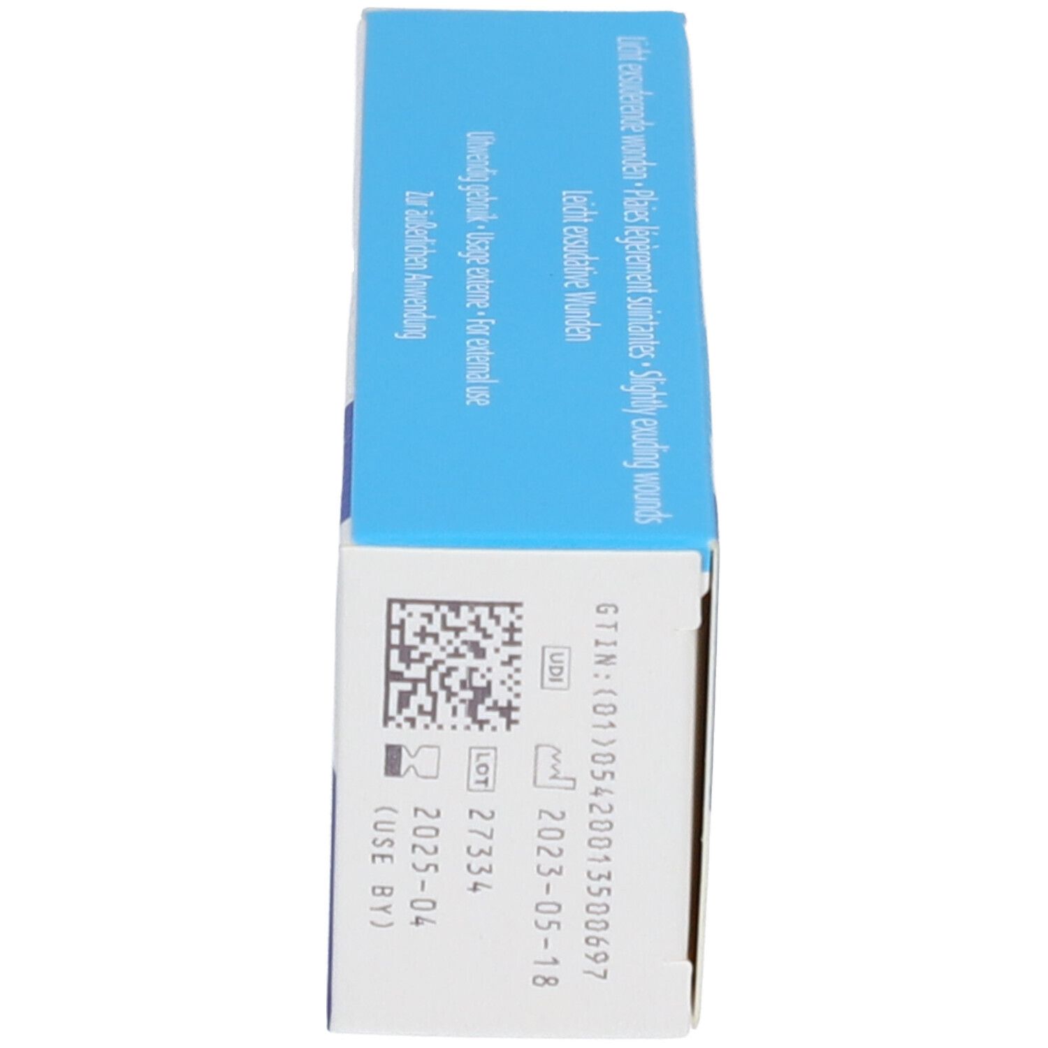 Boîte, dessous. Informations, code QR, numéro de lot et date de péremption.