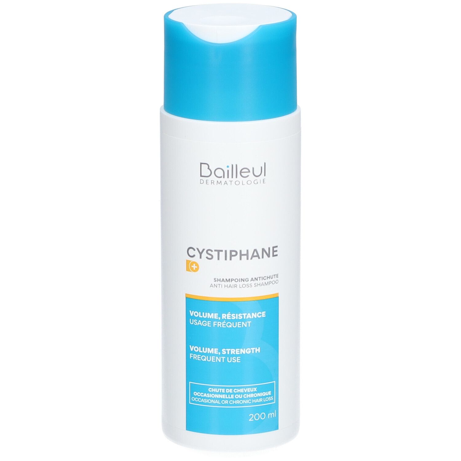 Flacon blanc et bleu de shampooing. Inscription: Cystiphane, Shampooing Antichute. Volume, résistance, usage fréquent.