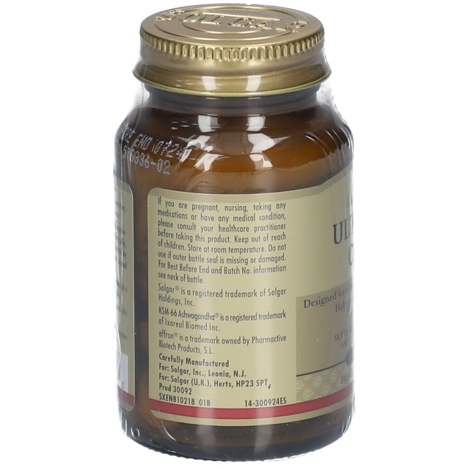 Dos d'un flacon en verre brun avec bouchon doré. Texte: informations, avertissements, ingrédients, fabricant.