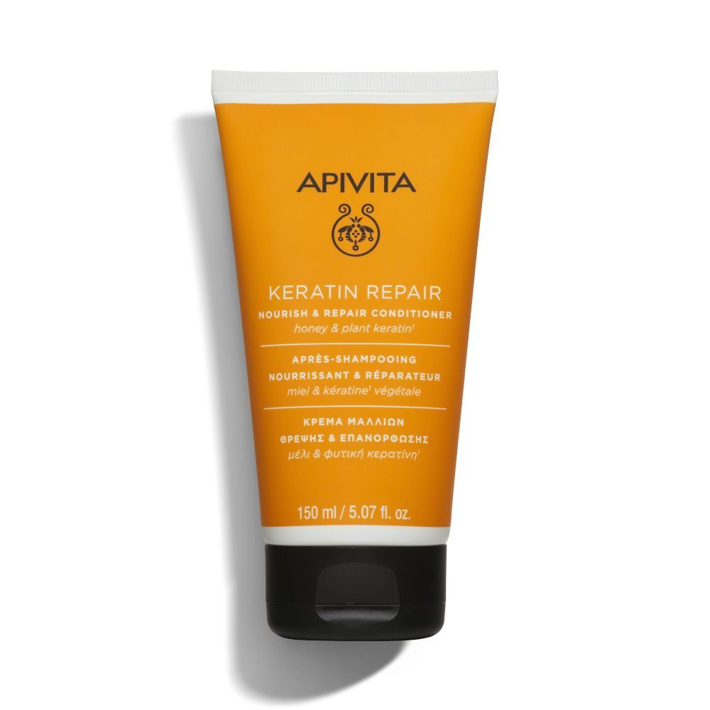 Tube jaune avec bouchon noir. Inscription: Apivita, Keratin Repair Conditioner.