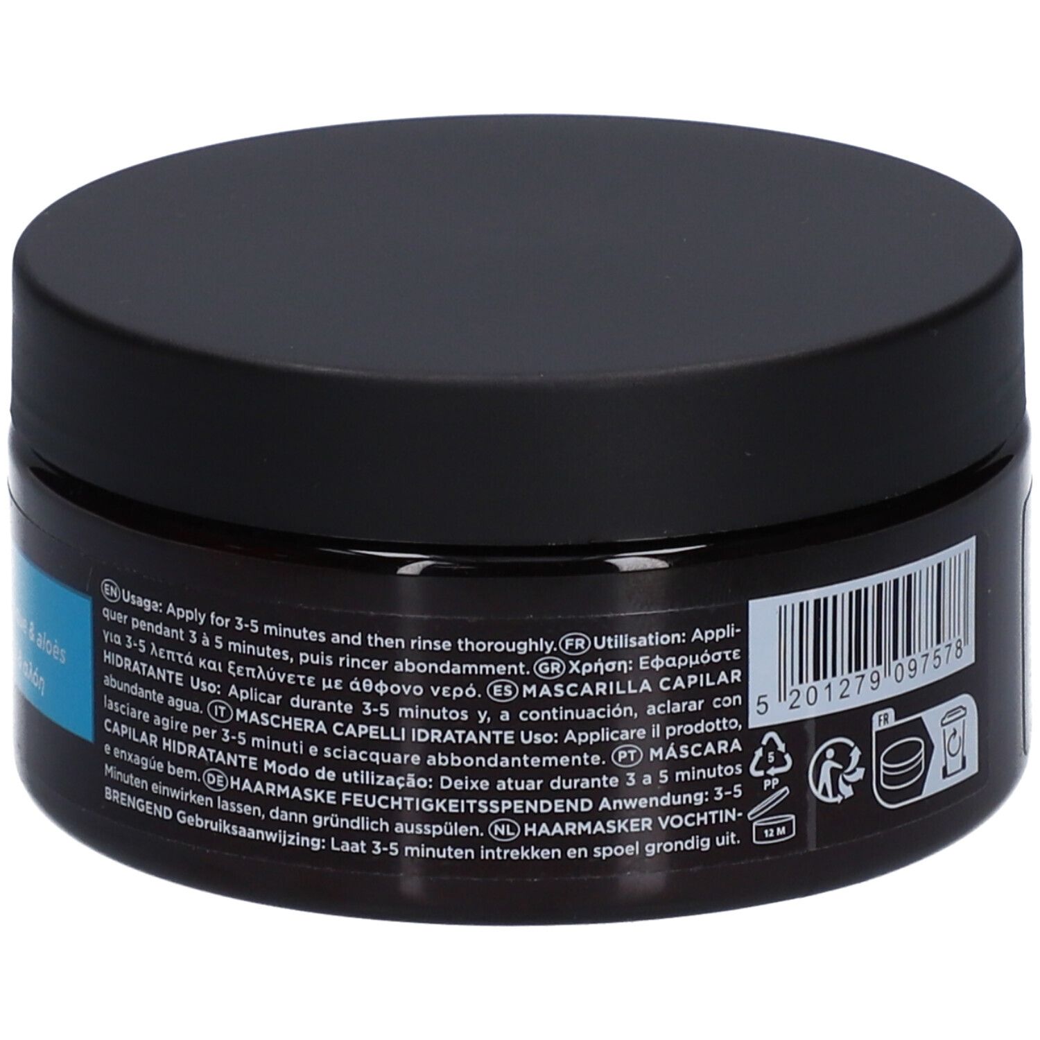 Achterkant van de bruine pot met zwart deksel. Tekst: Gebruik: 3-5 minuten laten inwerken. Barcode.