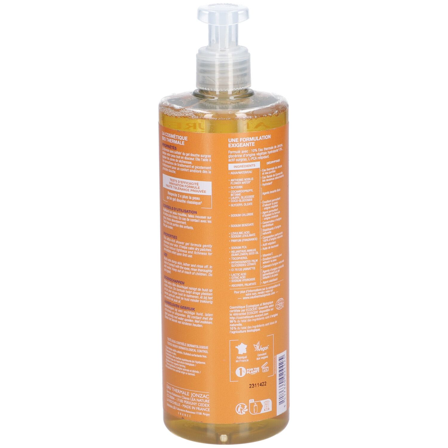 Transparente Flasche mit Dosierpumpe. Aufkleber mit Produktinformationen. Gelbe Flüssigkeit sichtbar.