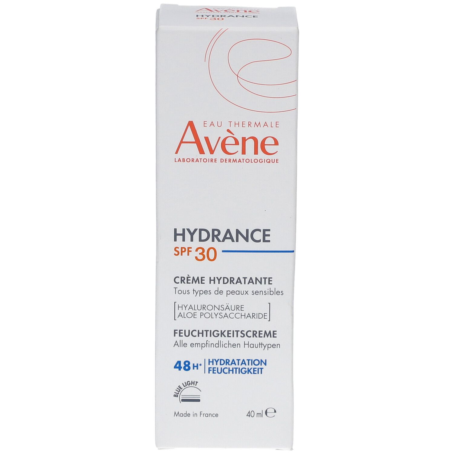 Weißer Karton mit Produktinformationen. Marke Avene, Hydrance SPF 30. Creme für empfindliche Haut. 48h Feuchtigkeit.