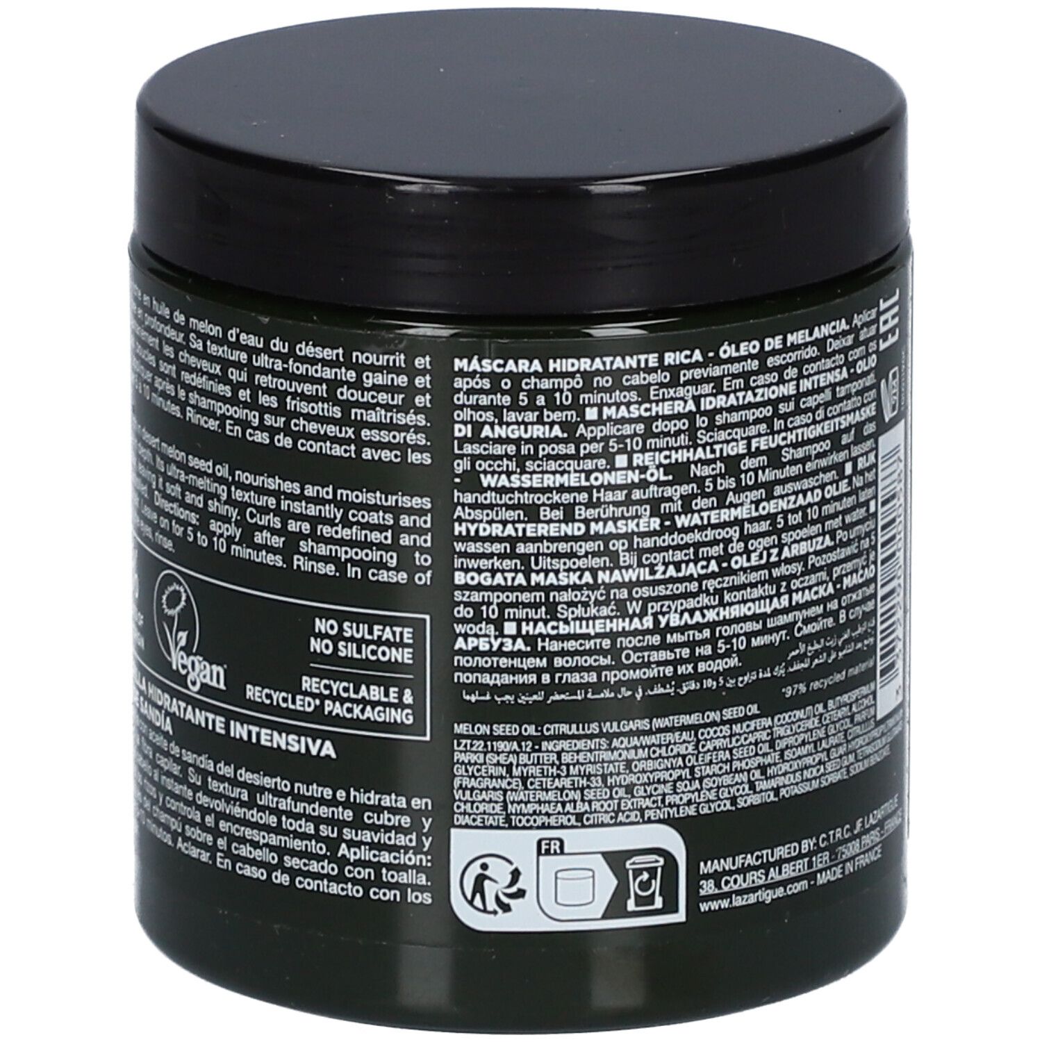 Dunkelgrüner Tiegel mit schwarzem Deckel. Text auf Etikett in mehreren Sprachen. Vegan, recycelte Verpackung.