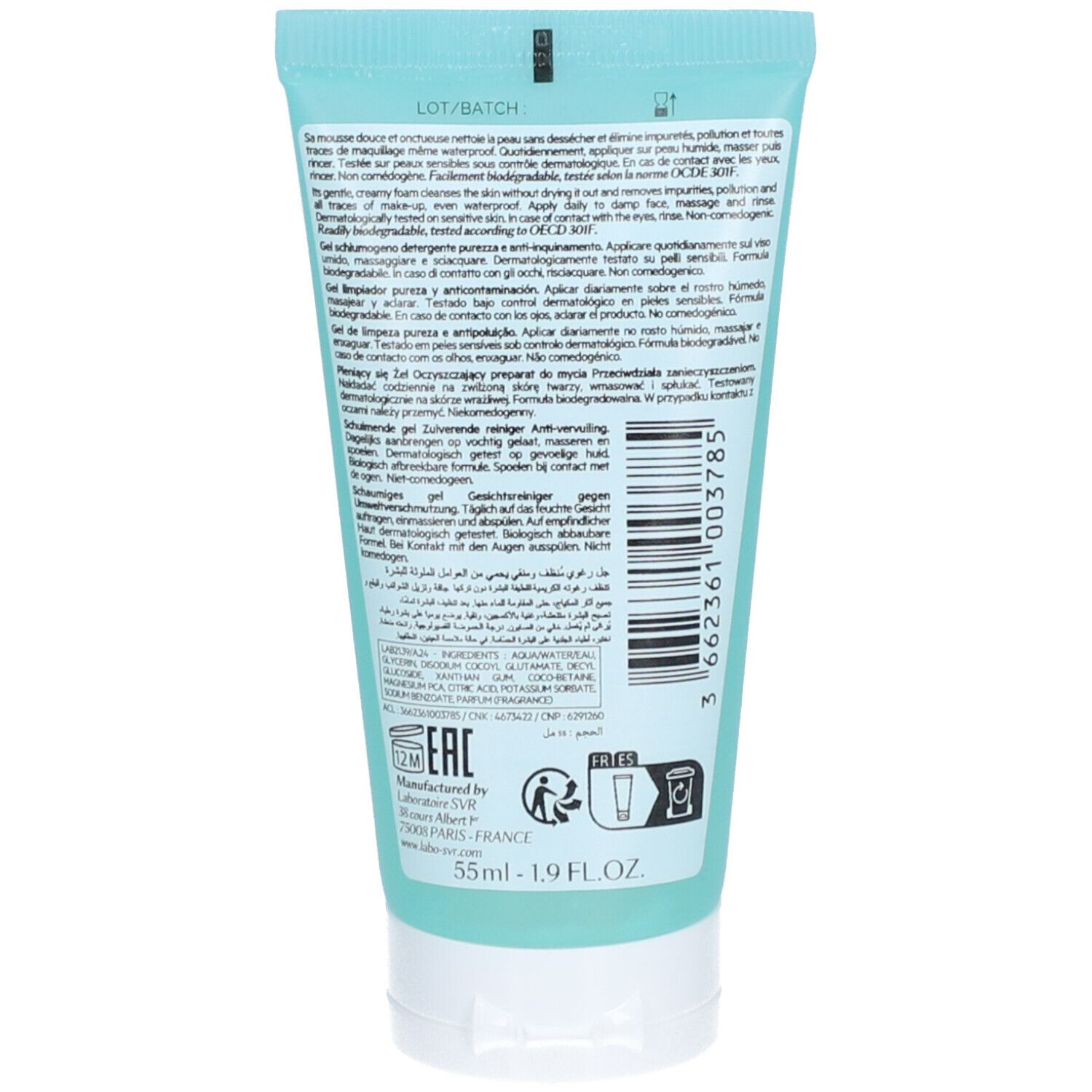 Achterkant van de turquoise tube. Meertalige tekst. Barcode en zegel. Fabrikantinformatie.