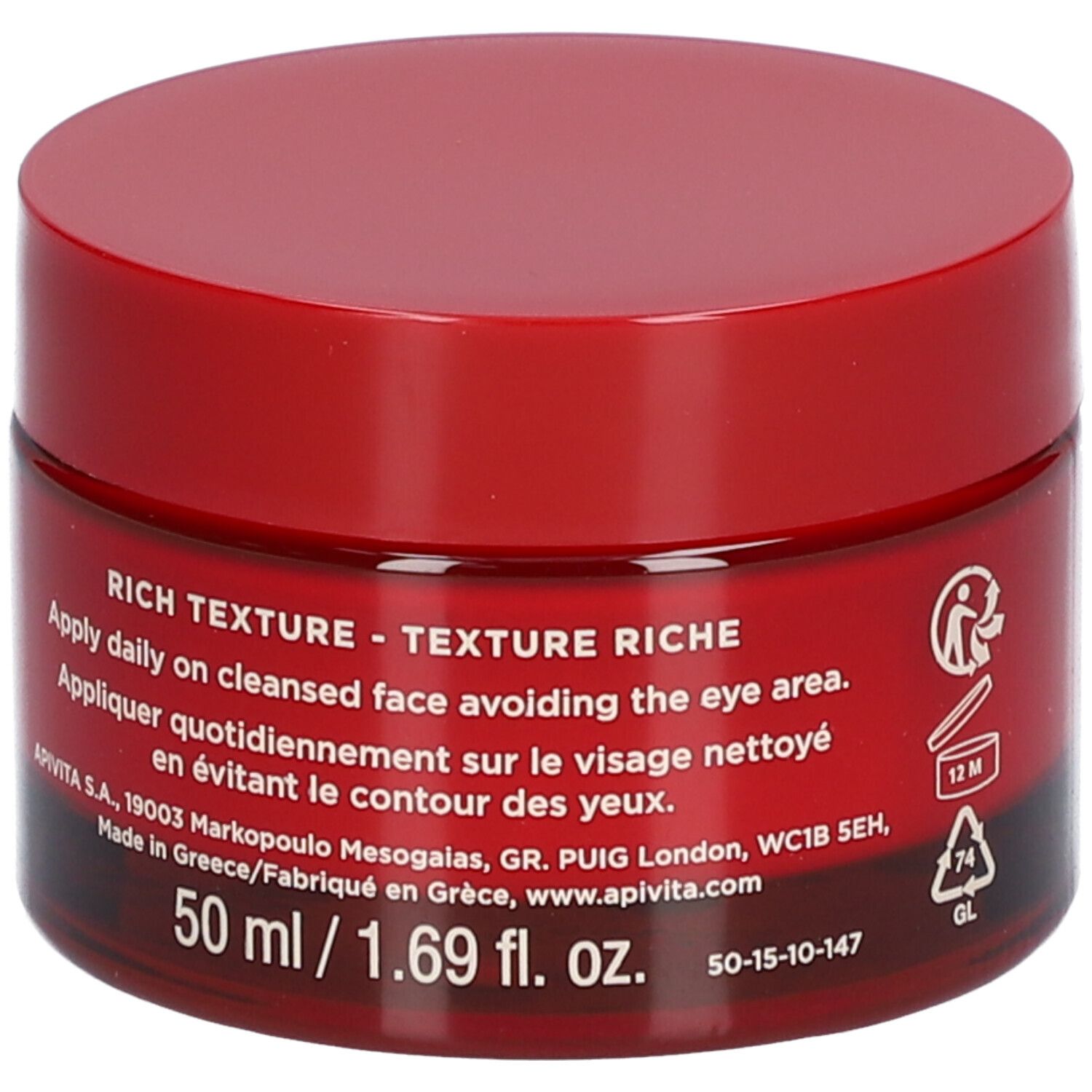 Roter Tiegel mit Deckel. Aufschrift: APIVITA BEEVINE ELIXIR. Textur- und Anwendungshinweise.