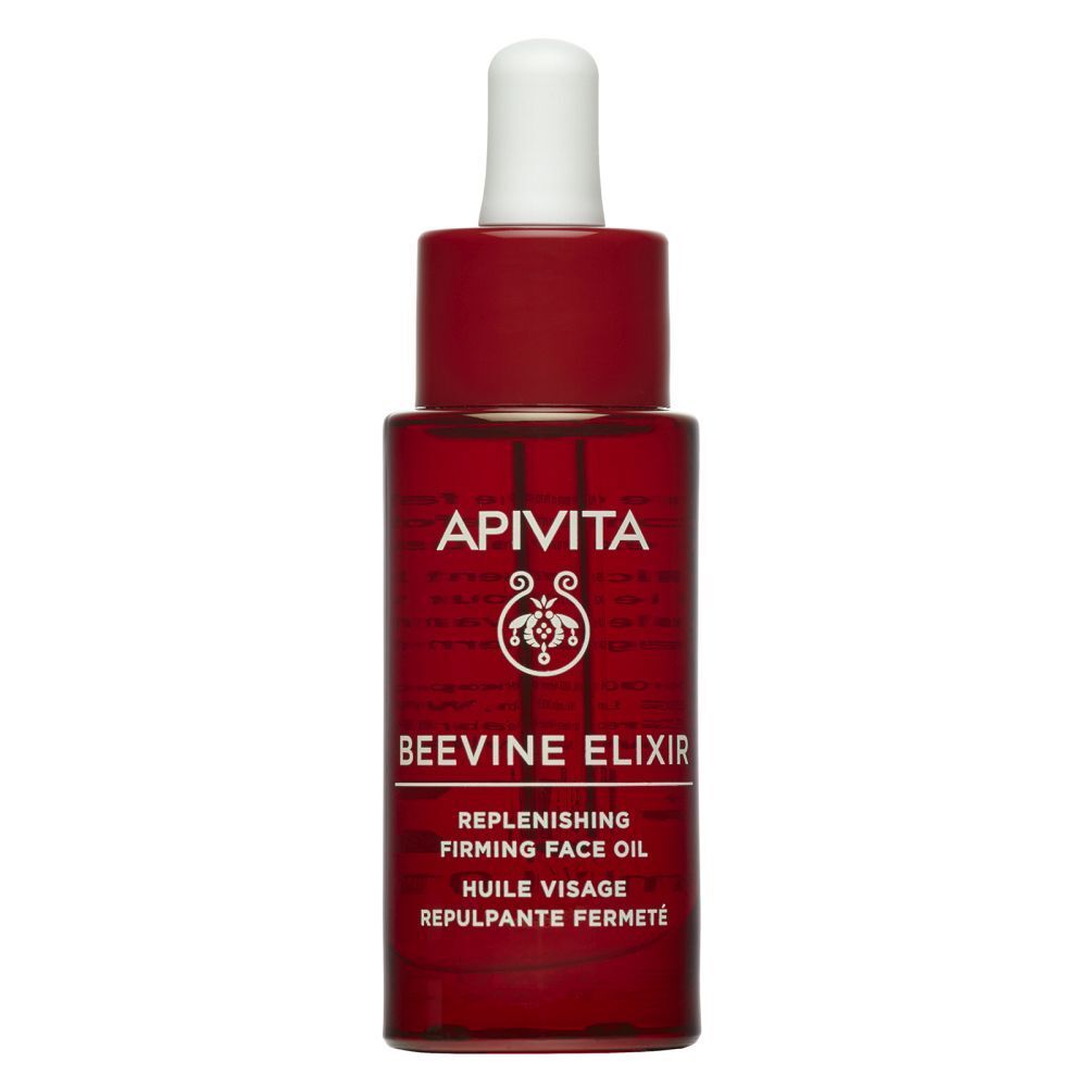 Boîte rouge avec inscription APIVITA BEEVINE ELIXIR. Huile visage. 30 ml.