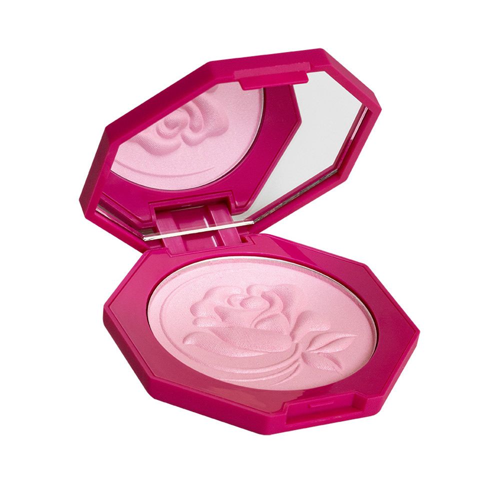 Fard à joues rose en poudre dans un boîtier octogonal avec miroir. Motif de rose sur la poudre. Texte : CENT PUR CENT.
