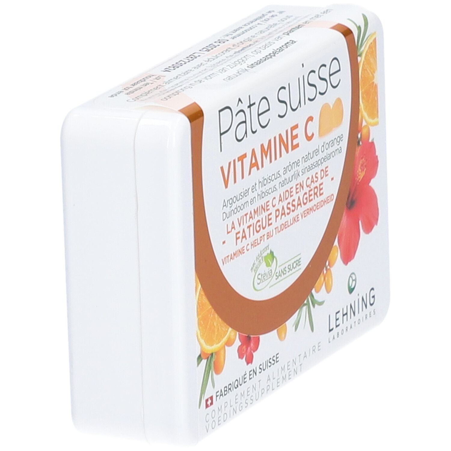 Boîte blanche inclinée. "Pâte suisse Vitamine C" et illustrations d'oranges et d'hibiscus visibles. "Lehning Laboratoires".