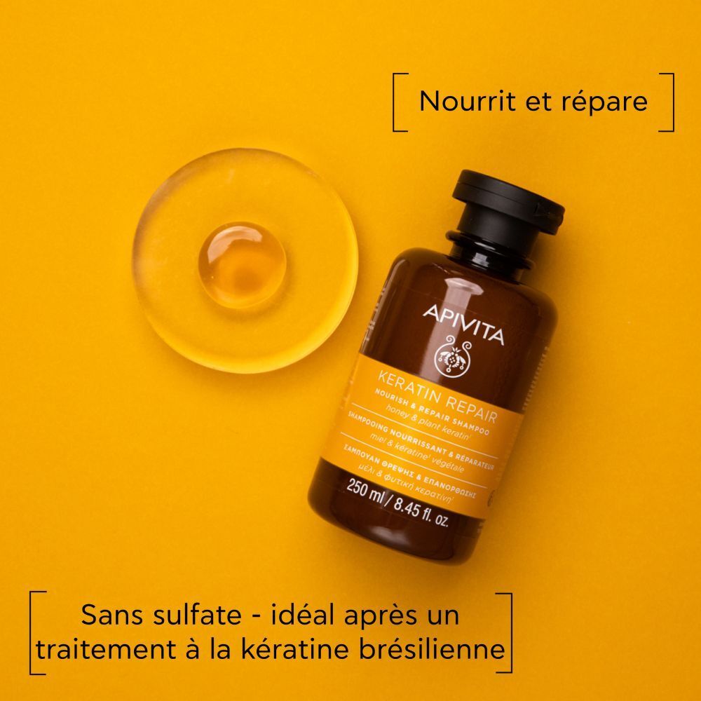 Fond jaune. Flacon et goutte. Texte: Nourrit et répare. Sans sulfate.