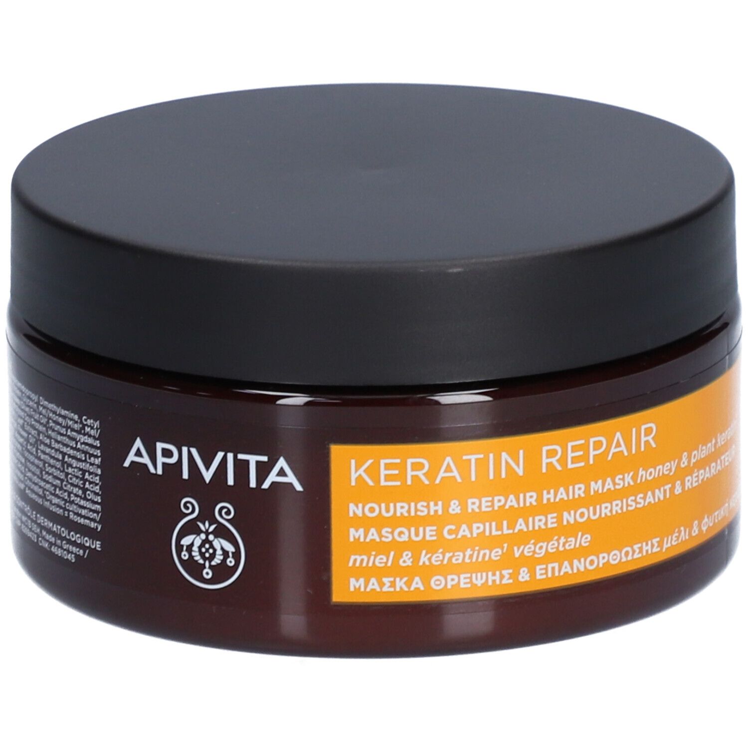 Pot brun avec couvercle noir. Inscription : Apivita, Keratin Repair, masque capillaire.