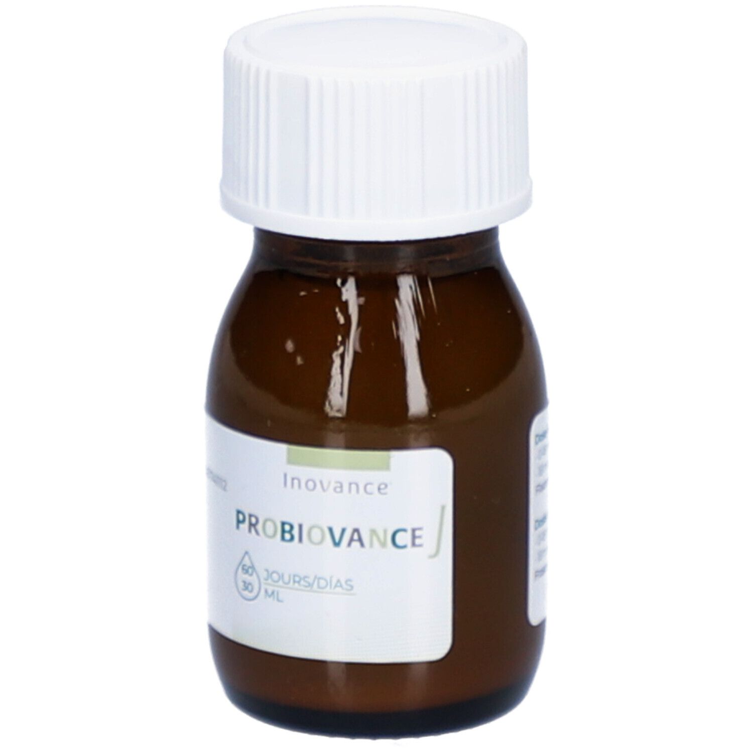 Flacon en verre brun avec bouchon blanc. Étiquette avec nom du produit et indication de volume.