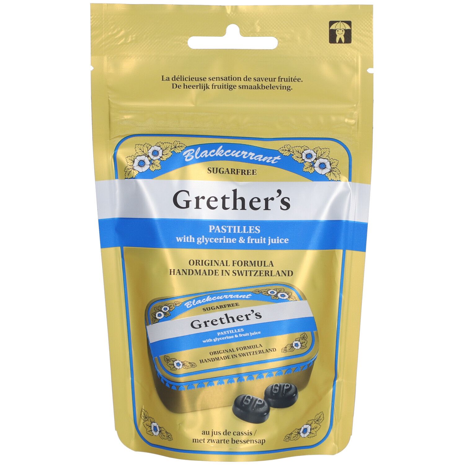 Beutel mit Pastillen. Aufschrift: Grether's Pastillen, Blackcurrant, zuckerfrei. Blaue und goldene Verpackung.