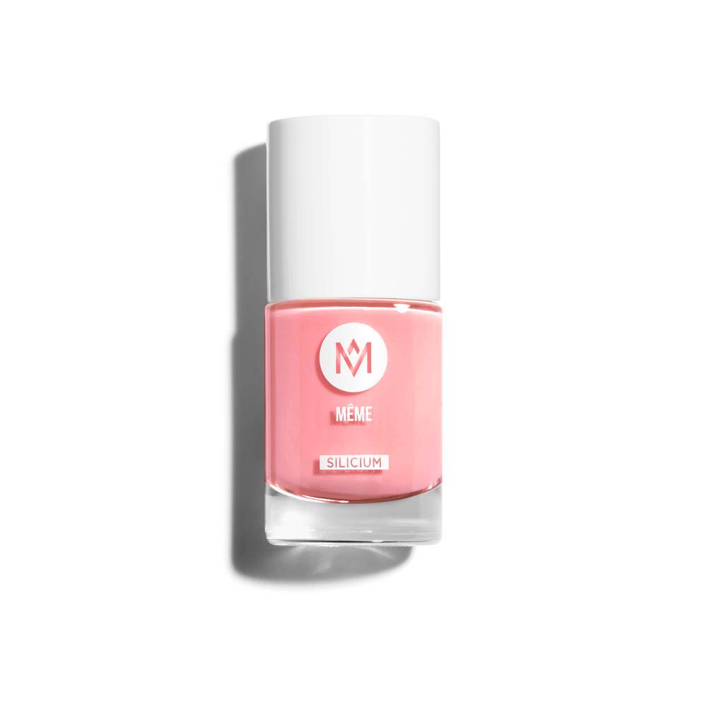 Flacon de vernis à ongles rose. Bouchon blanc, logo. Inscriptions: MEME, Silicium. Ombre.