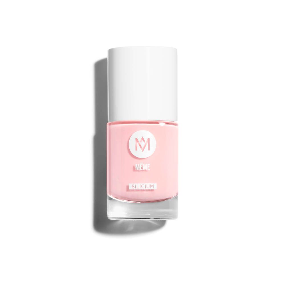 Flacon de vernis à ongles rose. Bouchon blanc avec logo vert. Inscription : MEME, Silicium.