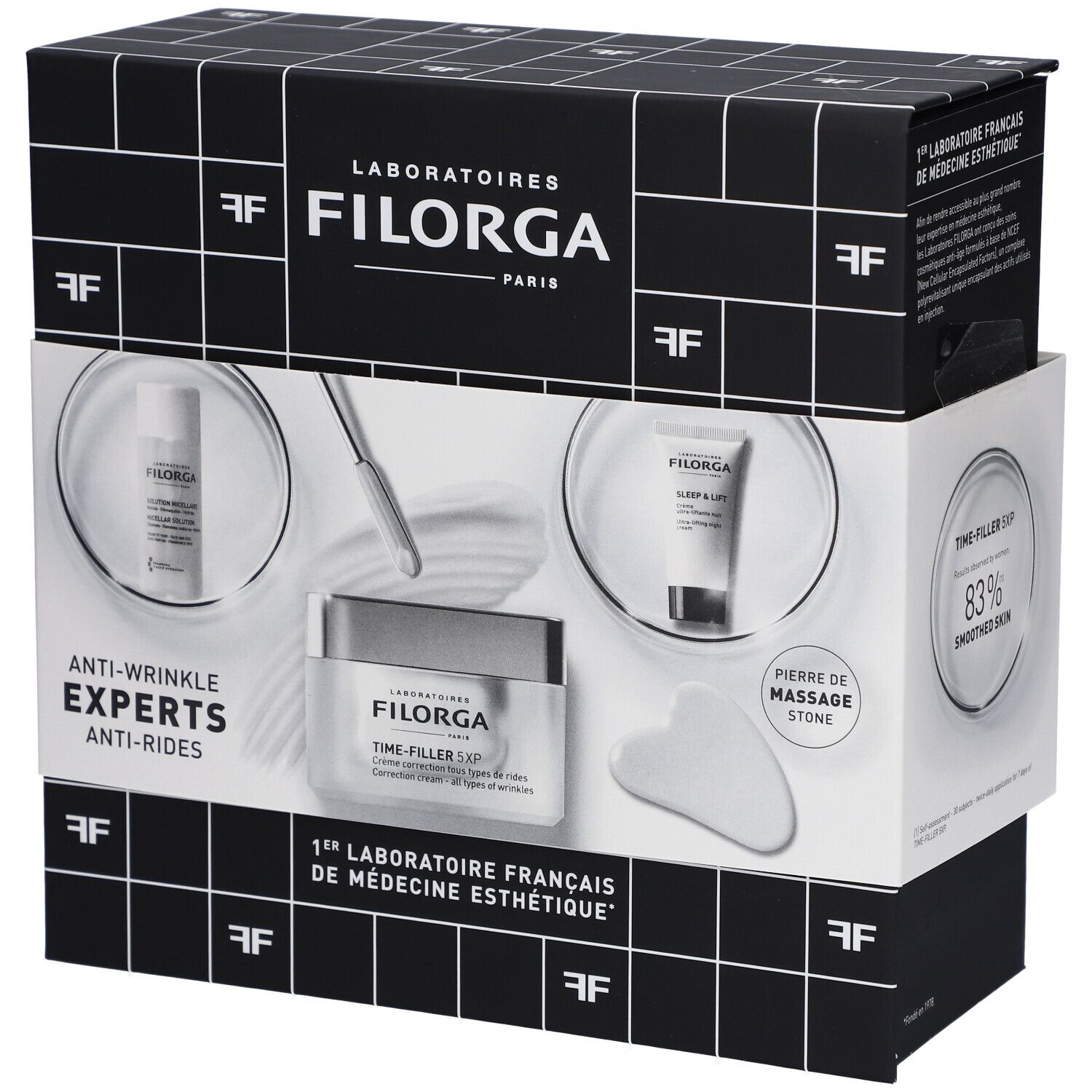 Coffret Filorga Experts Anti-Rides. Contient crème, sérum, rouleau de massage et autres produits. Emballage noir et blanc.