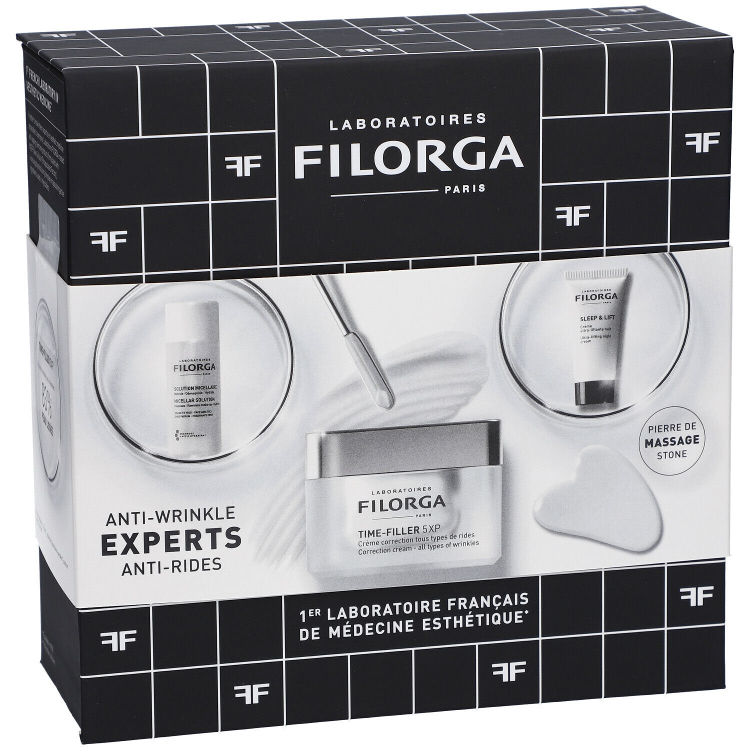 Coffret Filorga Experts Anti-Rides. Contient crème, sérum, rouleau de massage et autres produits. Emballage noir et blanc.