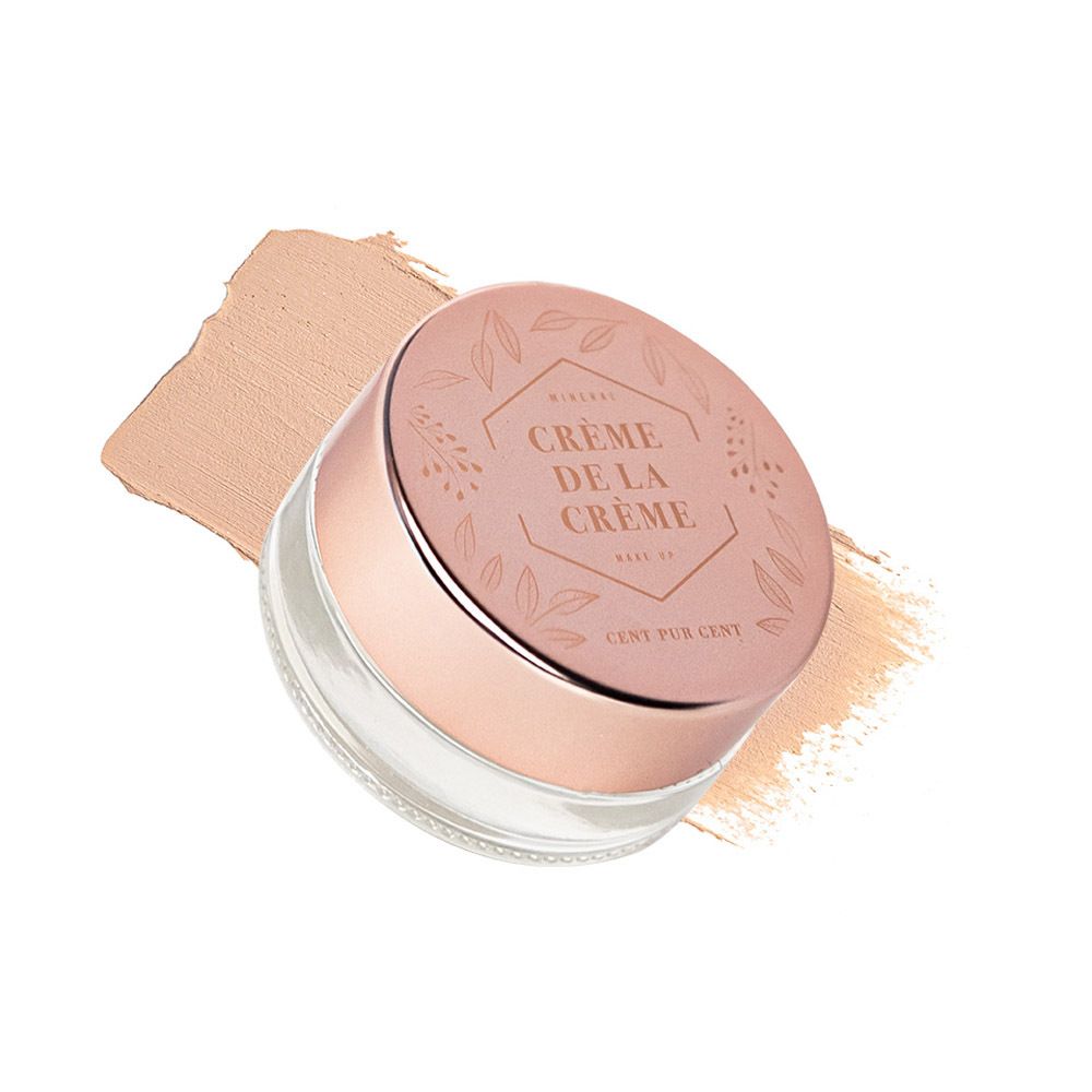 Pot rond avec couvercle rose et crème. À côté, une tache de couleur.