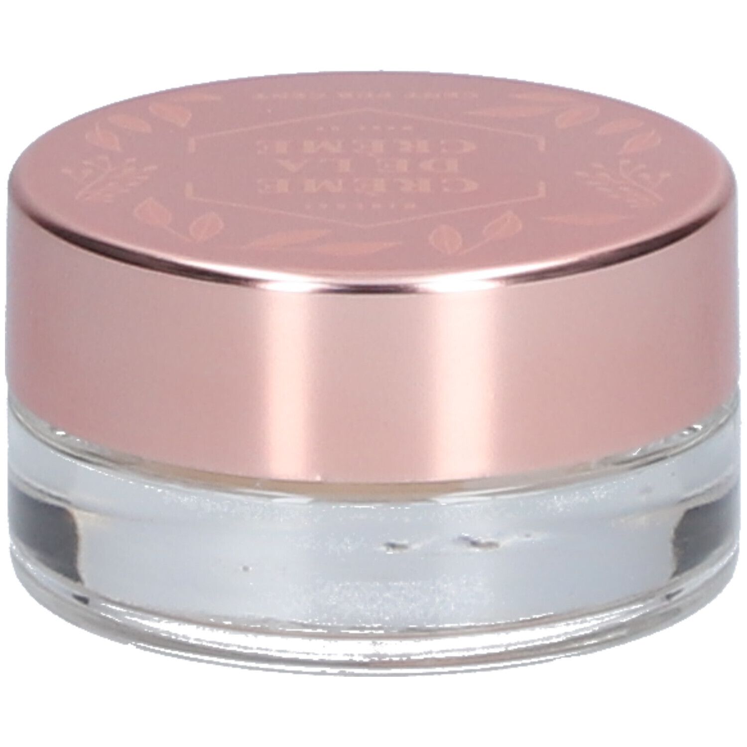 Pot rond transparent avec couvercle rose. "Crème de la Crème" est inscrit sur le couvercle.