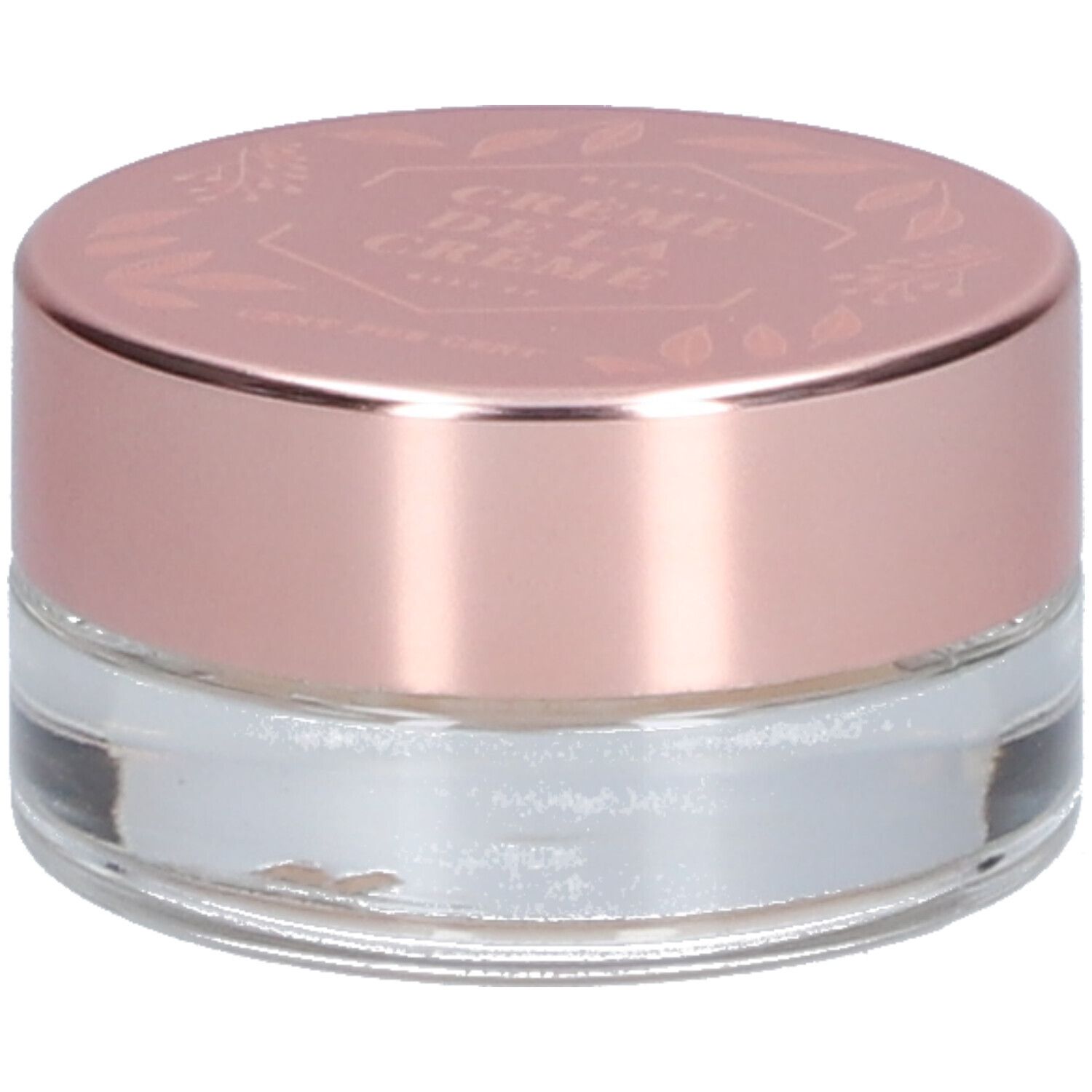 Pot rond transparent avec couvercle rose. "Crème de la Crème" est inscrit sur le couvercle.