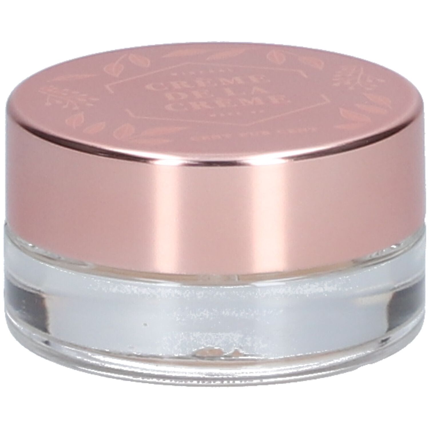 Pot rond transparent avec couvercle rose. "Crème de la Crème" est inscrit sur le couvercle.