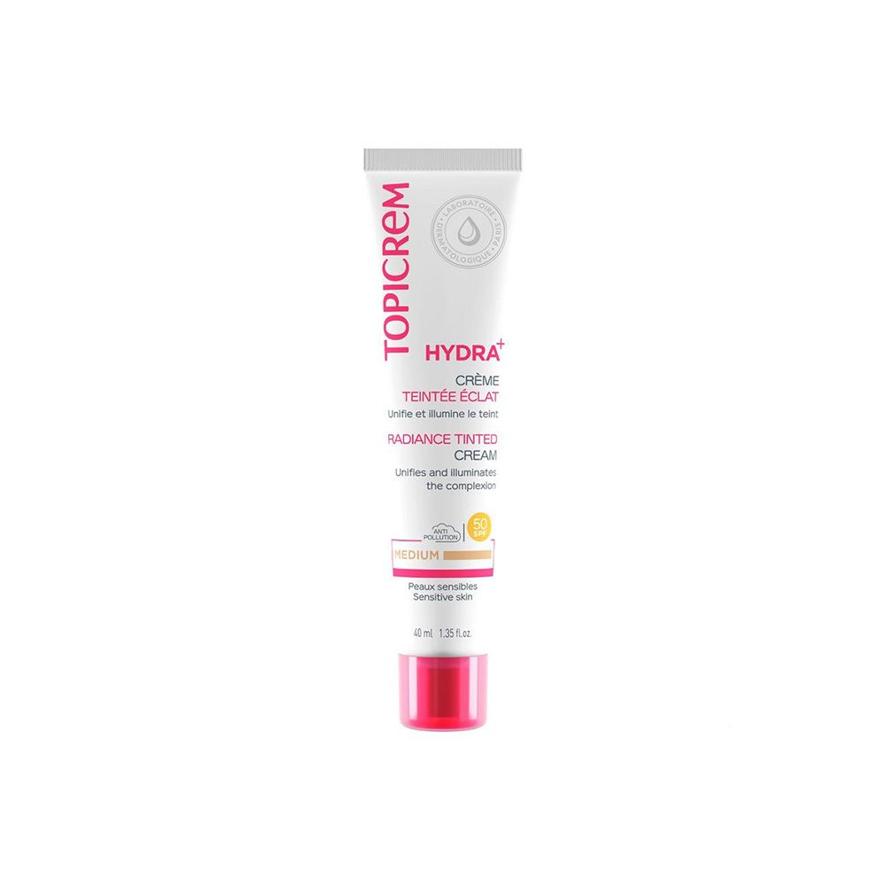 Tube Topicrem Hydra+ Crème Teintée Éclat Medium. Tube blanc, bouchon rose. Texte: Hydra+, Crème Teintée Éclat, Medium.