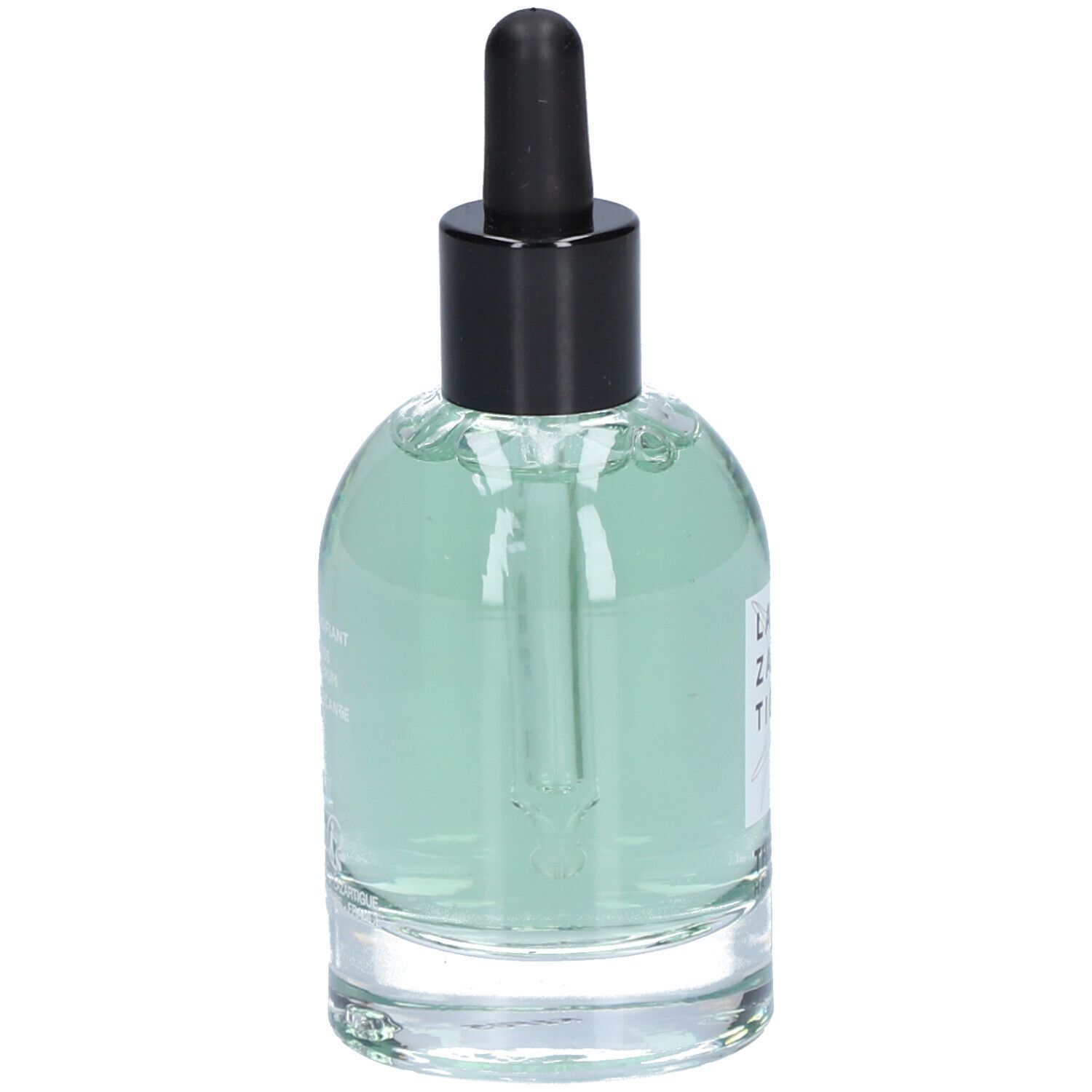 Glazen fles met serum, zwarte dop en pipet. Het serum is groenachtig. Op het etiket staat "Thicker Hair Serum".