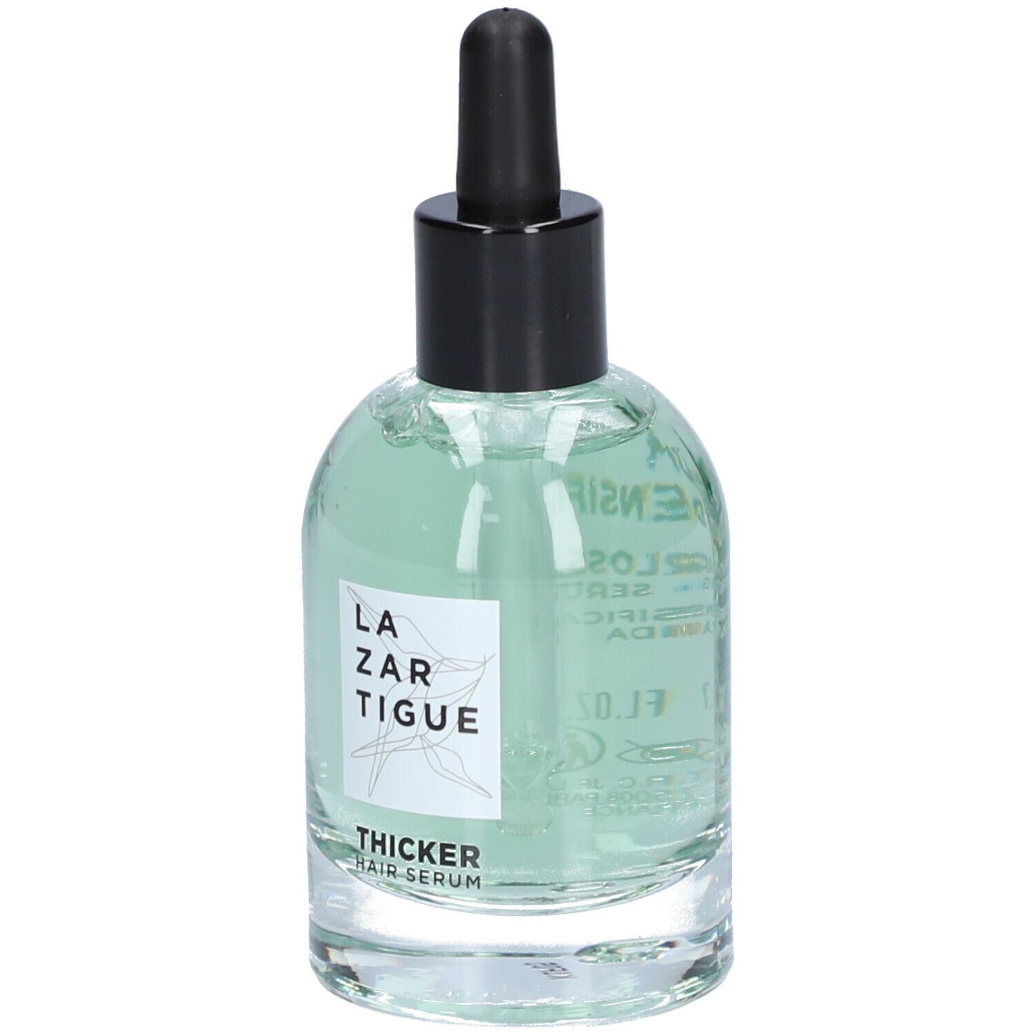 Glazen fles met groenachtig serum, zwarte dop en pipet. Op het etiket staat "Thicker Hair Serum".