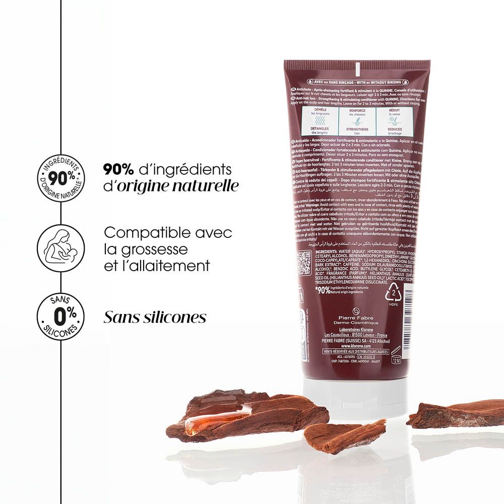 Dos du conditionneur Klorane. Texte, ingrédients, symbole de recyclage. Tube marron.