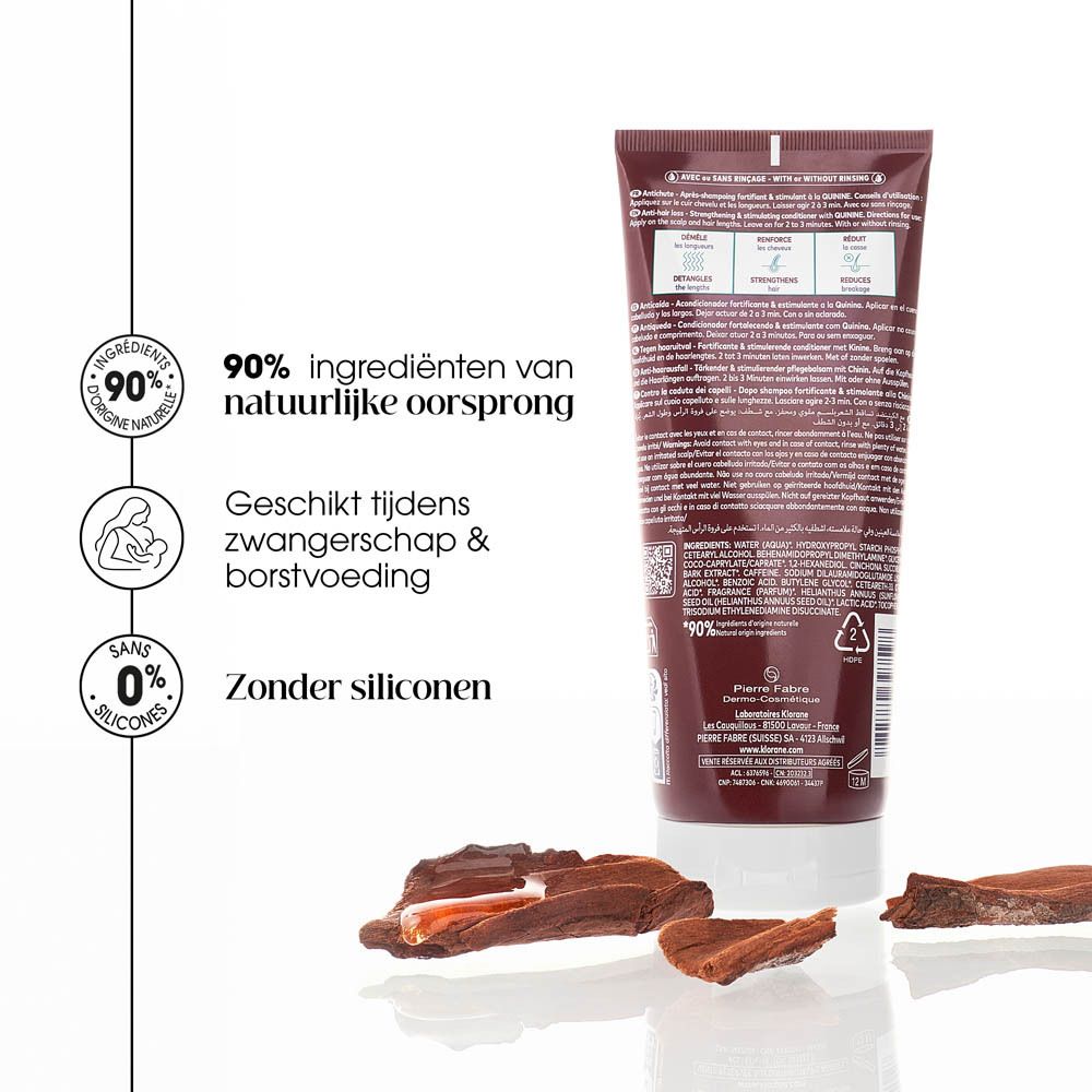 Achterkant Klorane conditioner. Tekst, ingrediënten, recycling symbool. Bruine tube.