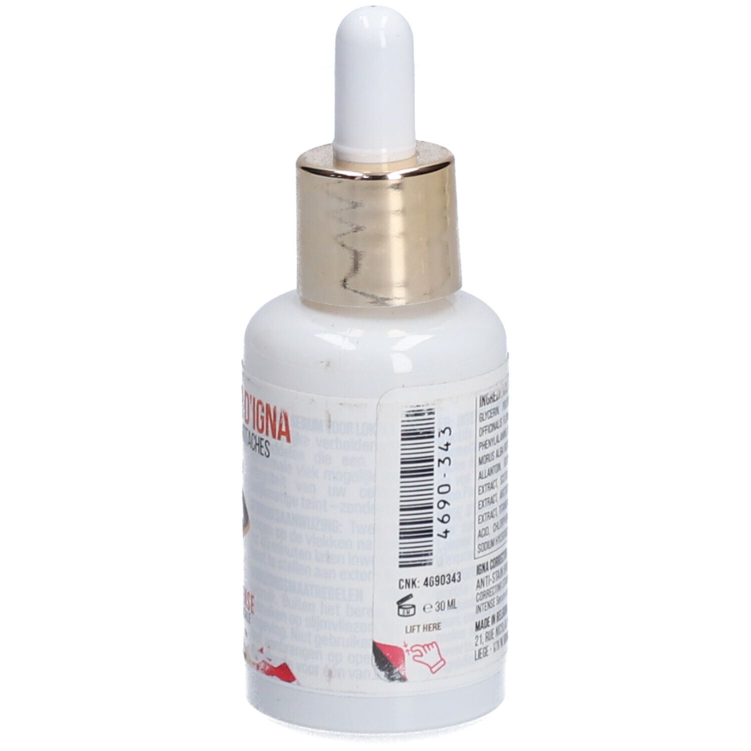 Weiße Flasche mit goldfarbenem Verschluss und Pipette. Aufschrift: CORRECTEUR D'IGNA, ECLAIRCISSANT ANTITACHES. Barcode und Text auf der Rückseite.
