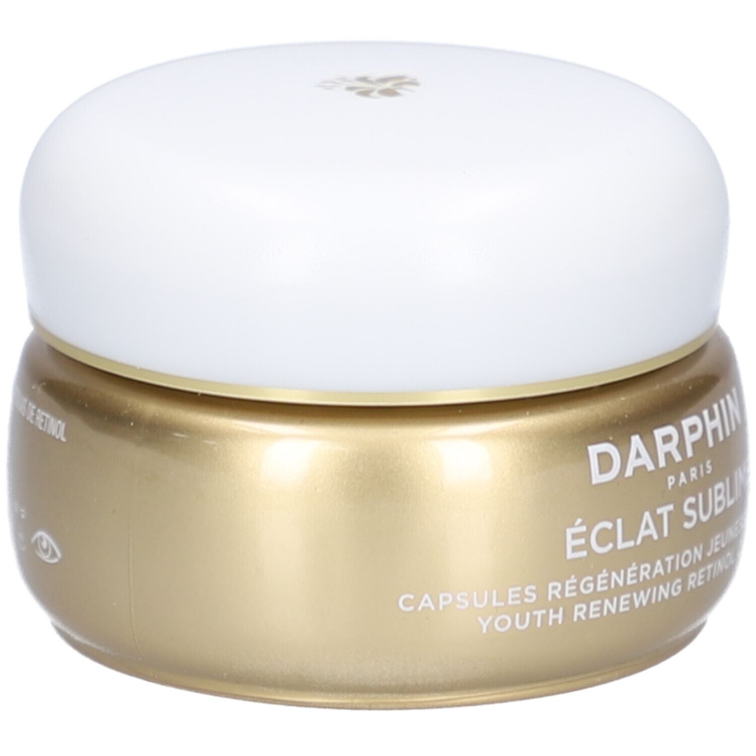 Goldfarbene Dose mit weißem Deckel. Aufschrift: Éclat Sublime, Capsules Régénération Jeunesse au Rétinol.