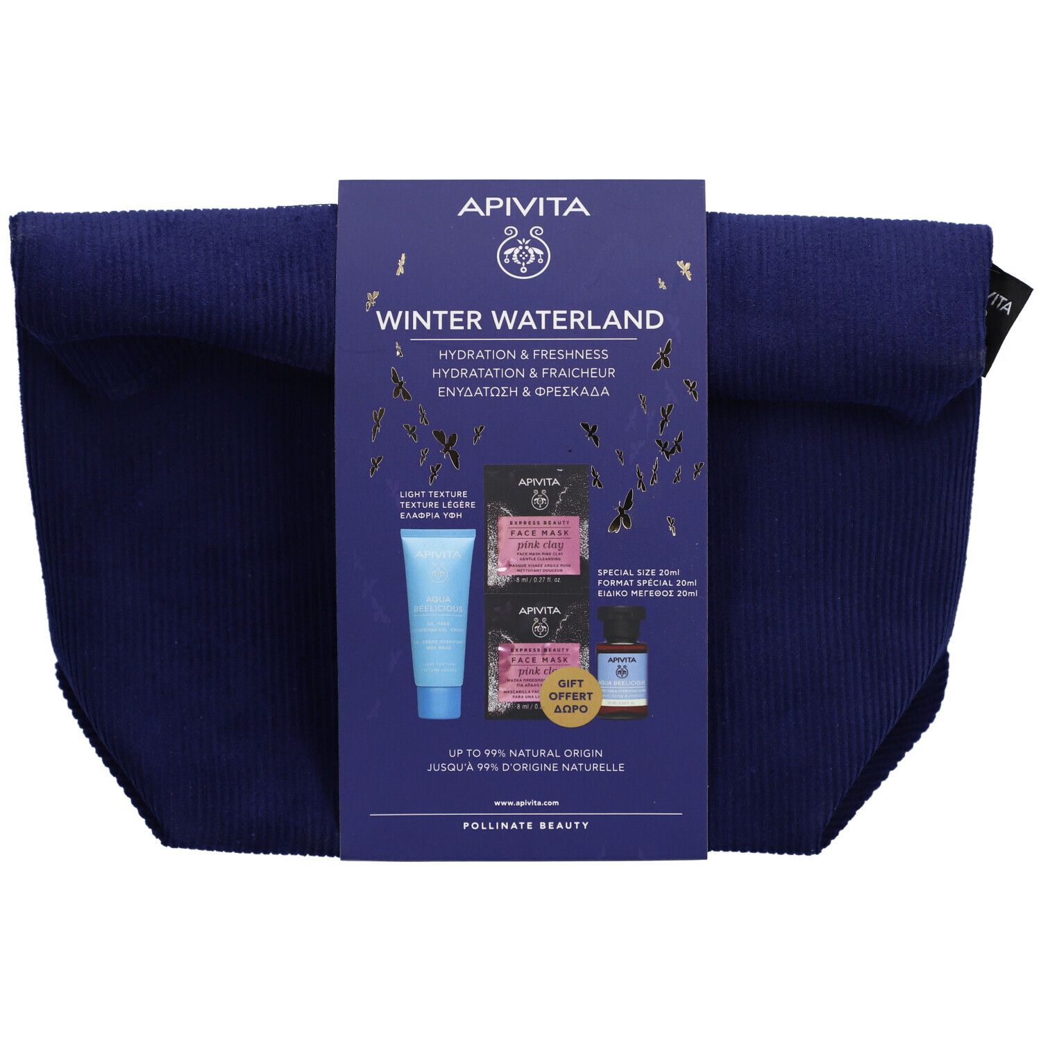 Donkerblauwe toilettas met productverpakking. Op de verpakking: Apivita Winter Waterland, gezichtsmaskers, serum.