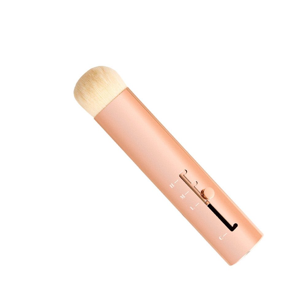 Uitschuifbare borstel met roségouden handvat en lichte borstelkop. Schuine weergave.