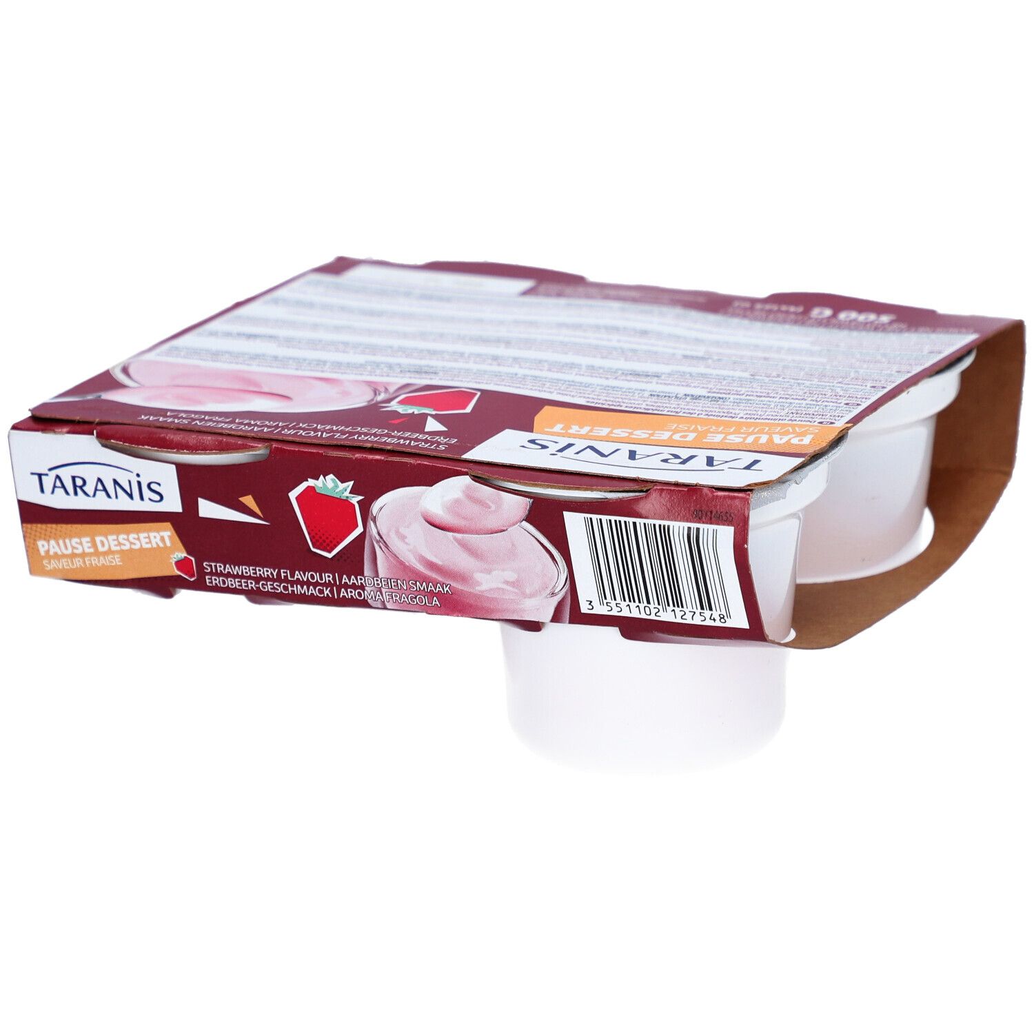 Verpakking met vier witte bekers. Opschrift: Taranis Pause Dessert, aardbeiensmaak. Kartonnen verpakking.