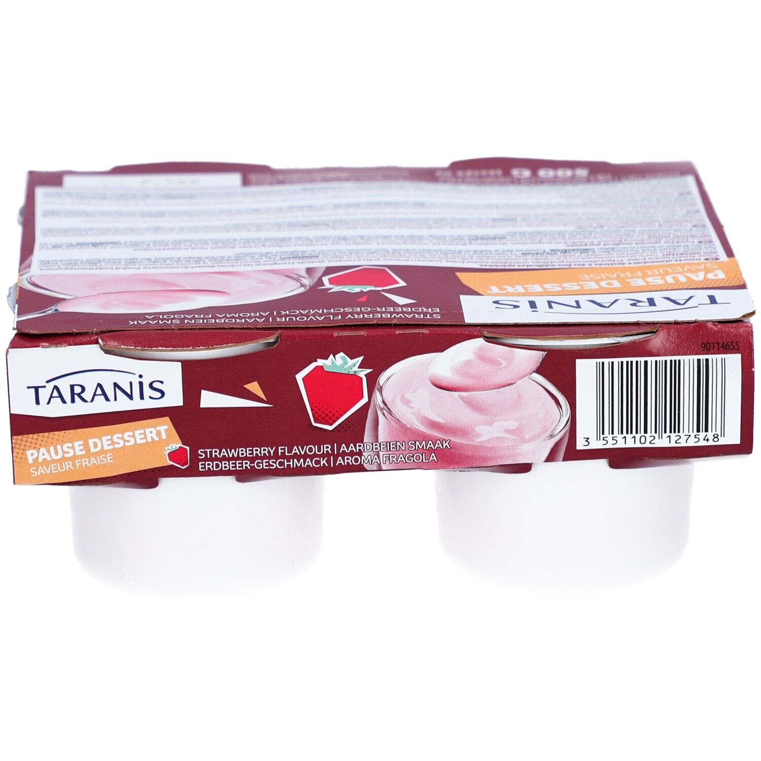Verpakking met vier witte bekers. Opschrift: Taranis Pause Dessert, aardbeiensmaak. Kartonnen verpakking.