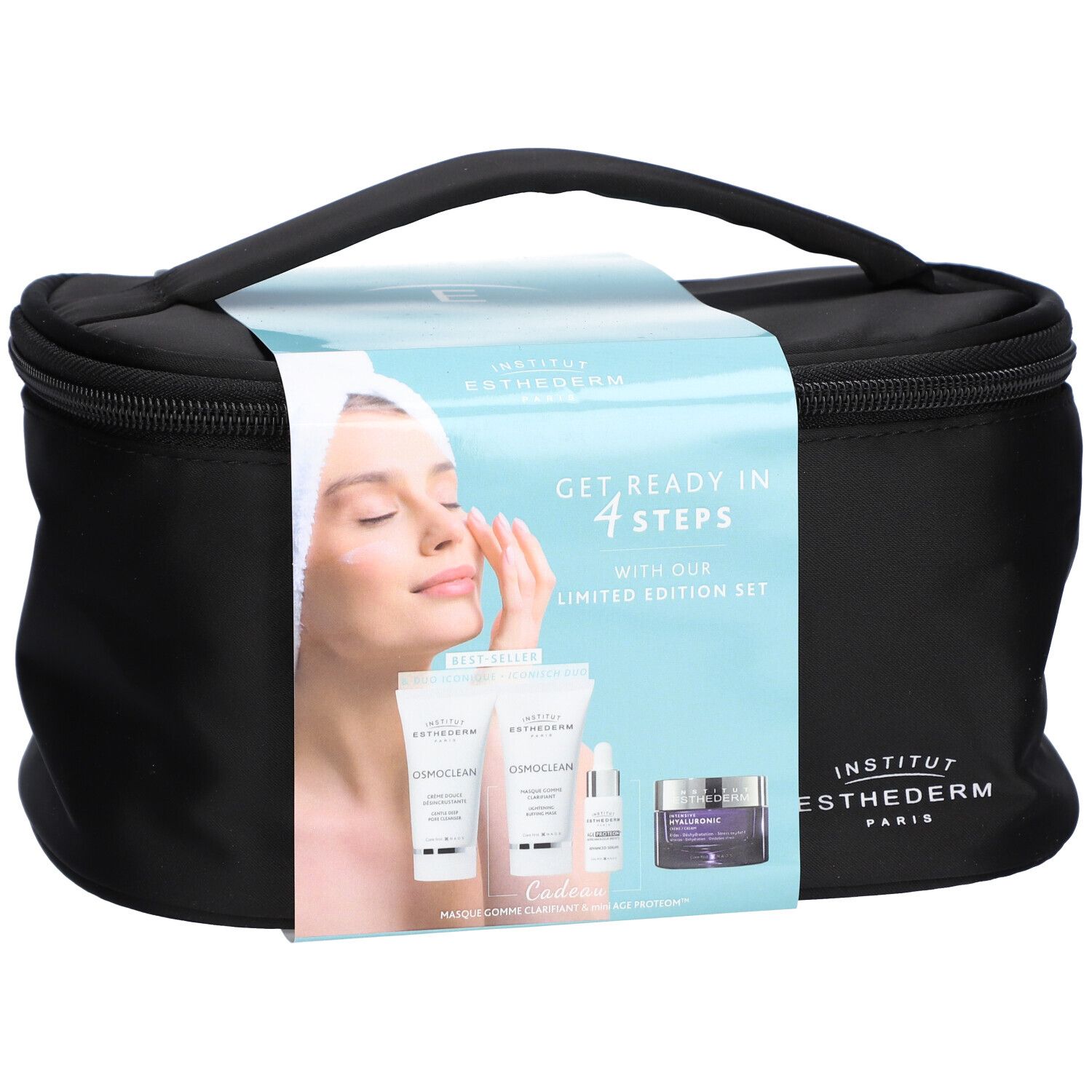 Trousse de toilette noire avec poignée et emballage produit. Sur l'emballage : femme, produits, texte 'Get Ready in 4 Steps'.