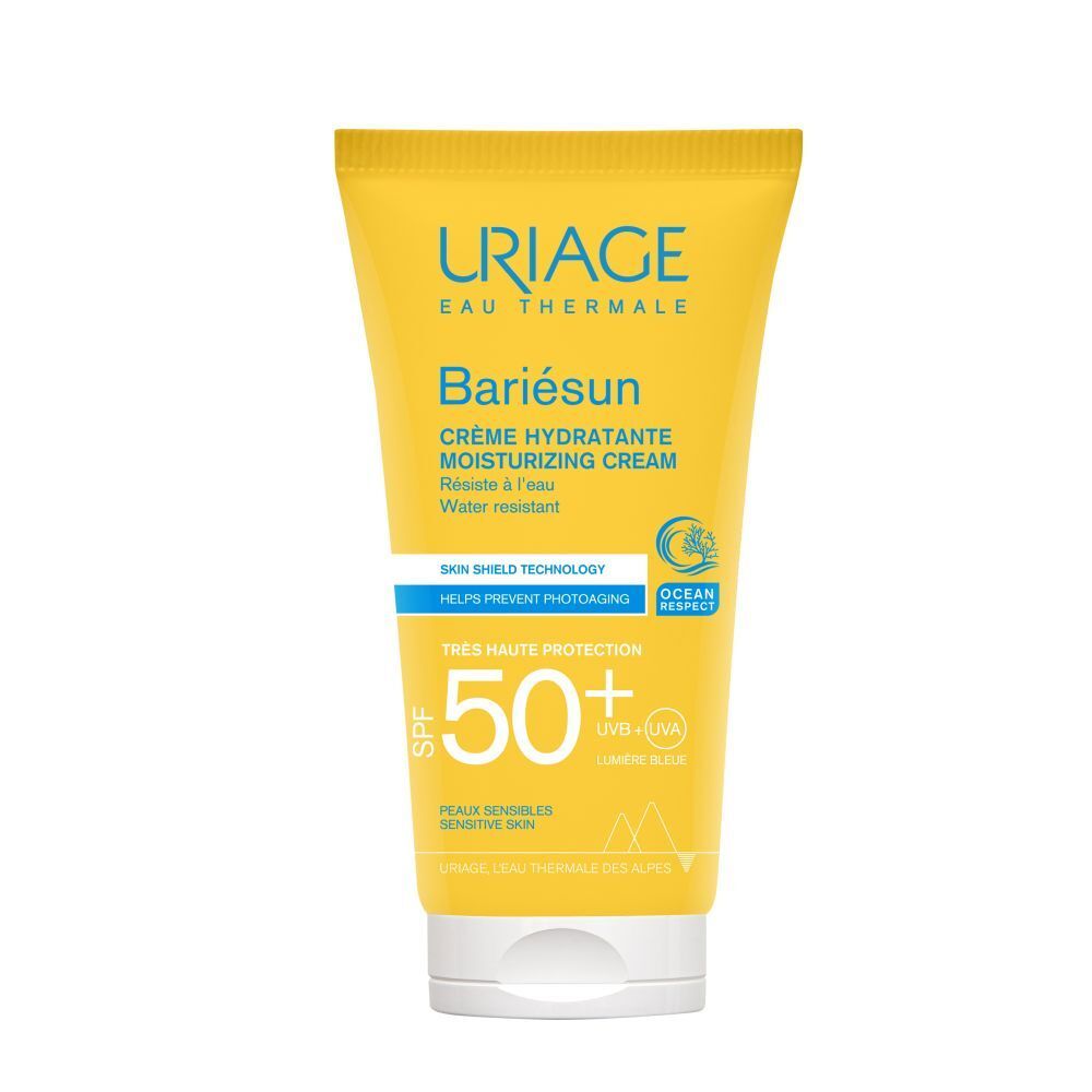 Tube jaune Uriage. Nom du produit et informations SPF 50+ visibles. Crème solaire.