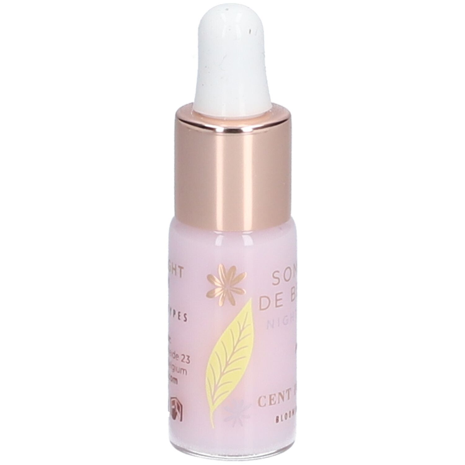 Roze flesje met pipet. Opschrift: Sommeil de Beauté Night Serum. Met bloemmotieven.
