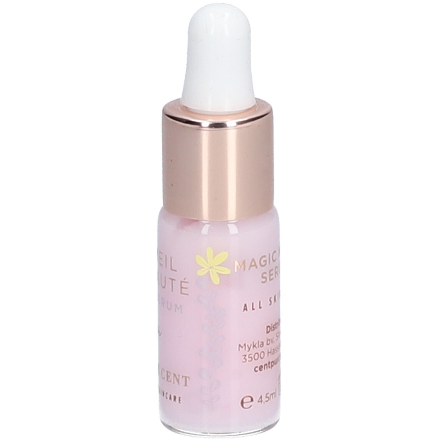 Roze flesje met pipet. Opschrift: Magic Night Serum. Voor alle huidtypes. Fabrikant informatie.