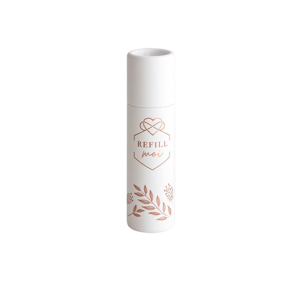 Witte cilindrische houder met roze logo en bloemen decoratie. Opschrift: REFILL moi.