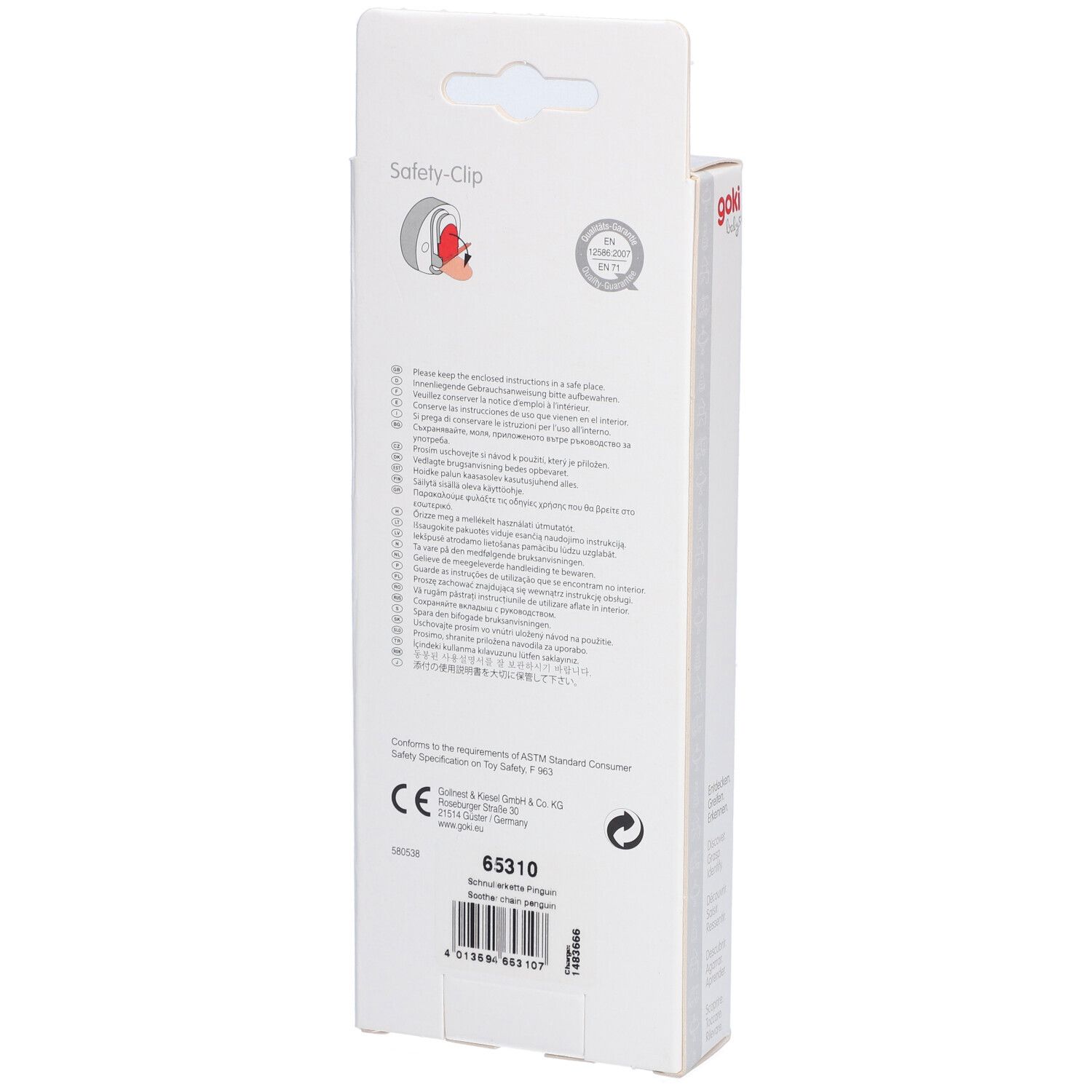 Rückseite der Verpackung des Goki Schnullerhakens. Text und CE-Kennzeichnung. Produktcode 65310.