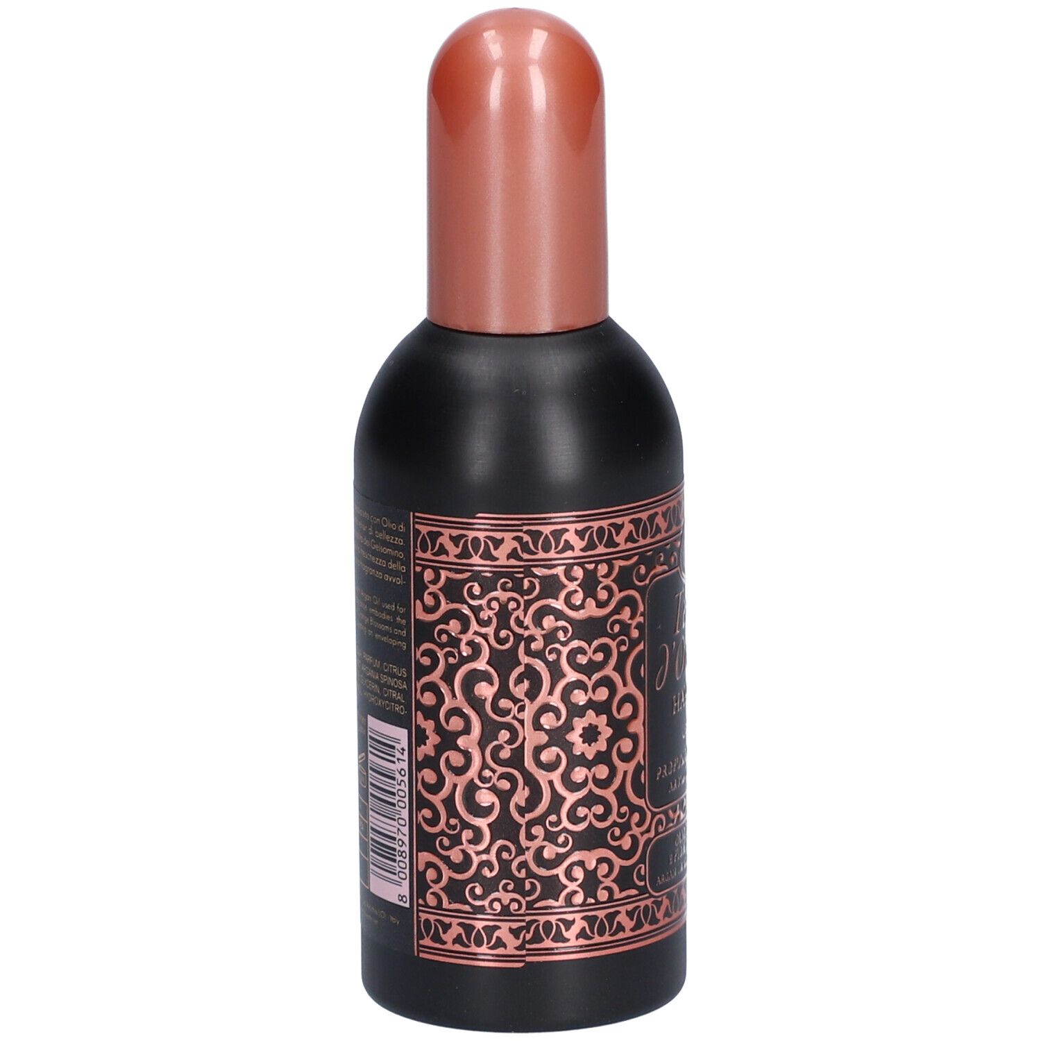 Zwarte fles met koperkleurige dop. Achterkant met tekst en barcode. Ornamentaal patroon in koperkleur.