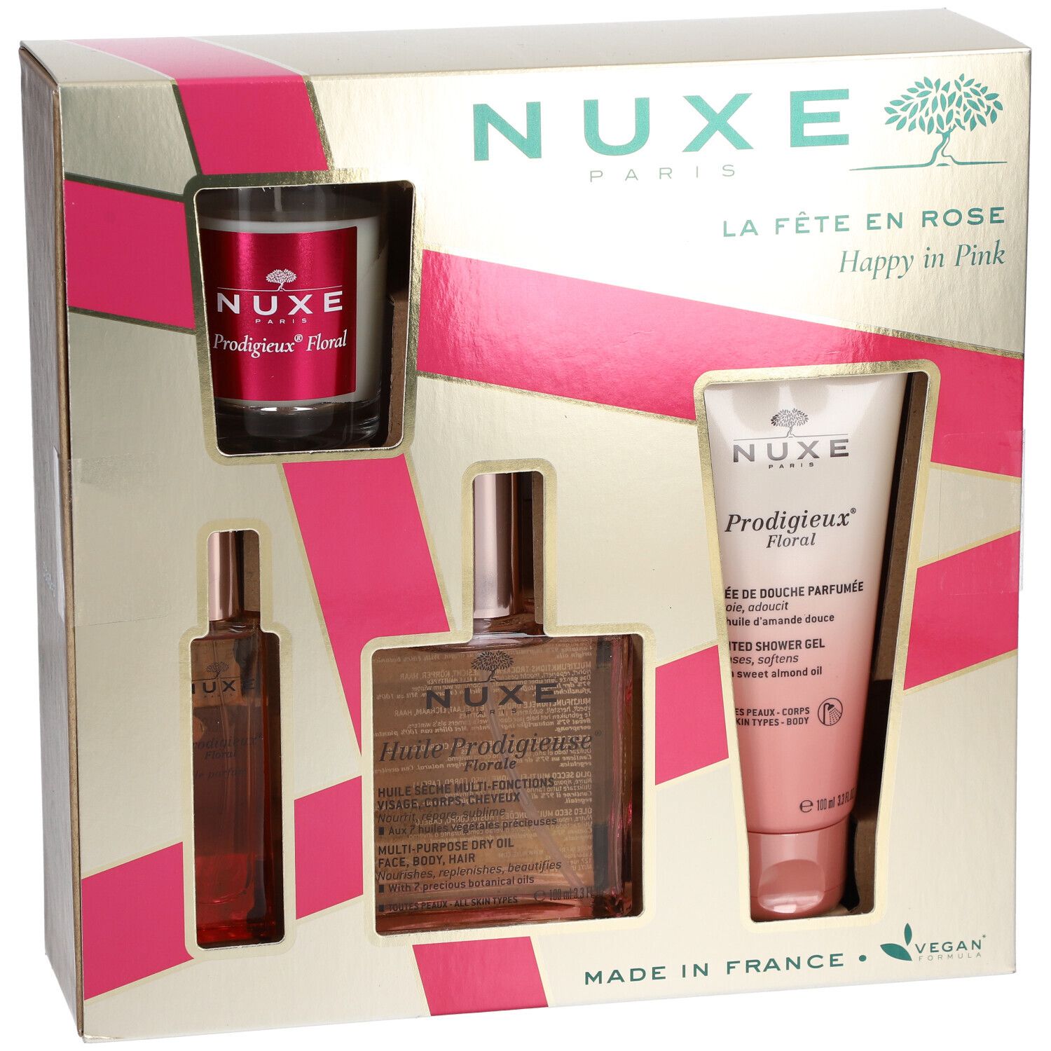 Coffret cadeau Nuxe. Contient bougie, huile parfumée, gel douche et huile sèche. Emballage avec accents roses.