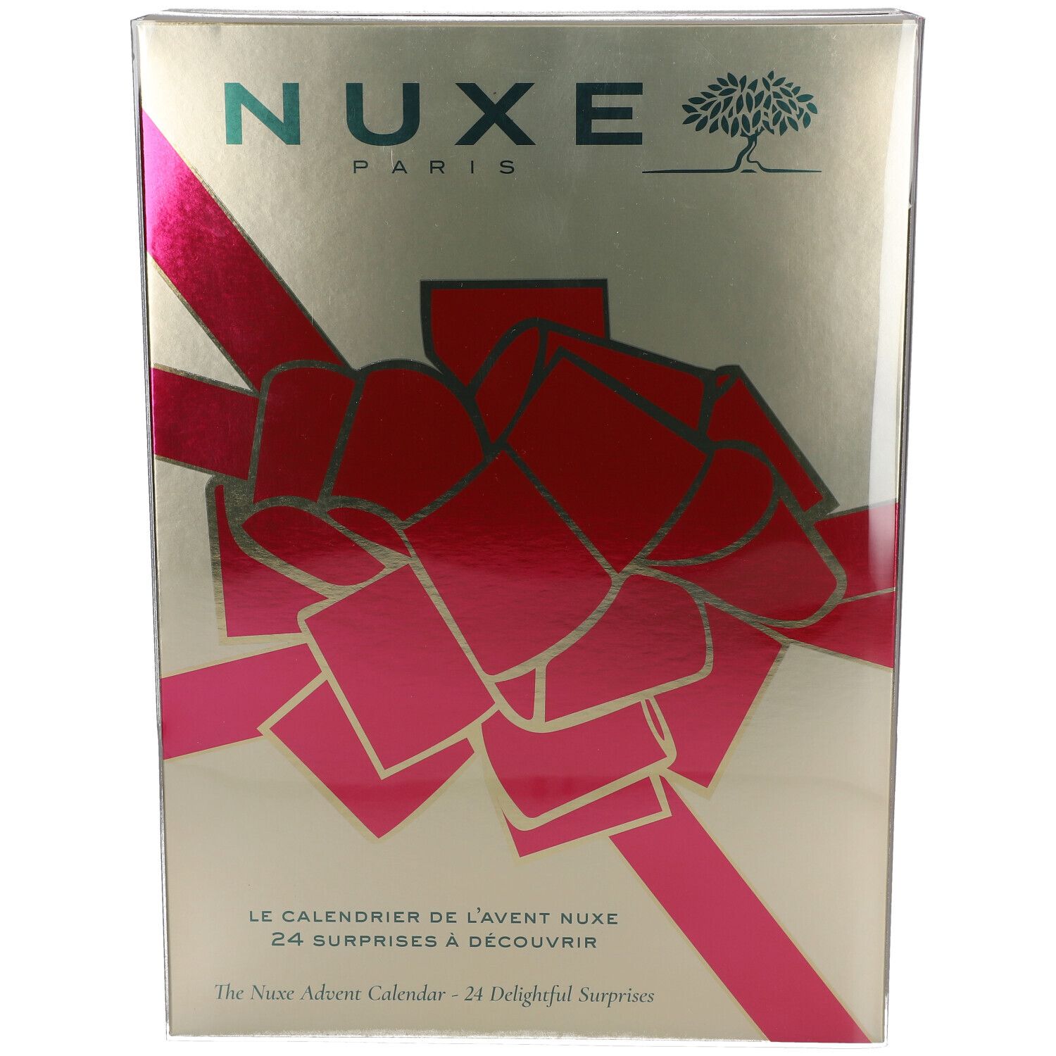 Calendrier de l'Avent doré avec un ruban rouge. NUXE PARIS en haut. Texte: Le calendrier de l'avent Nuxe. 24 surprises à découvrir.
