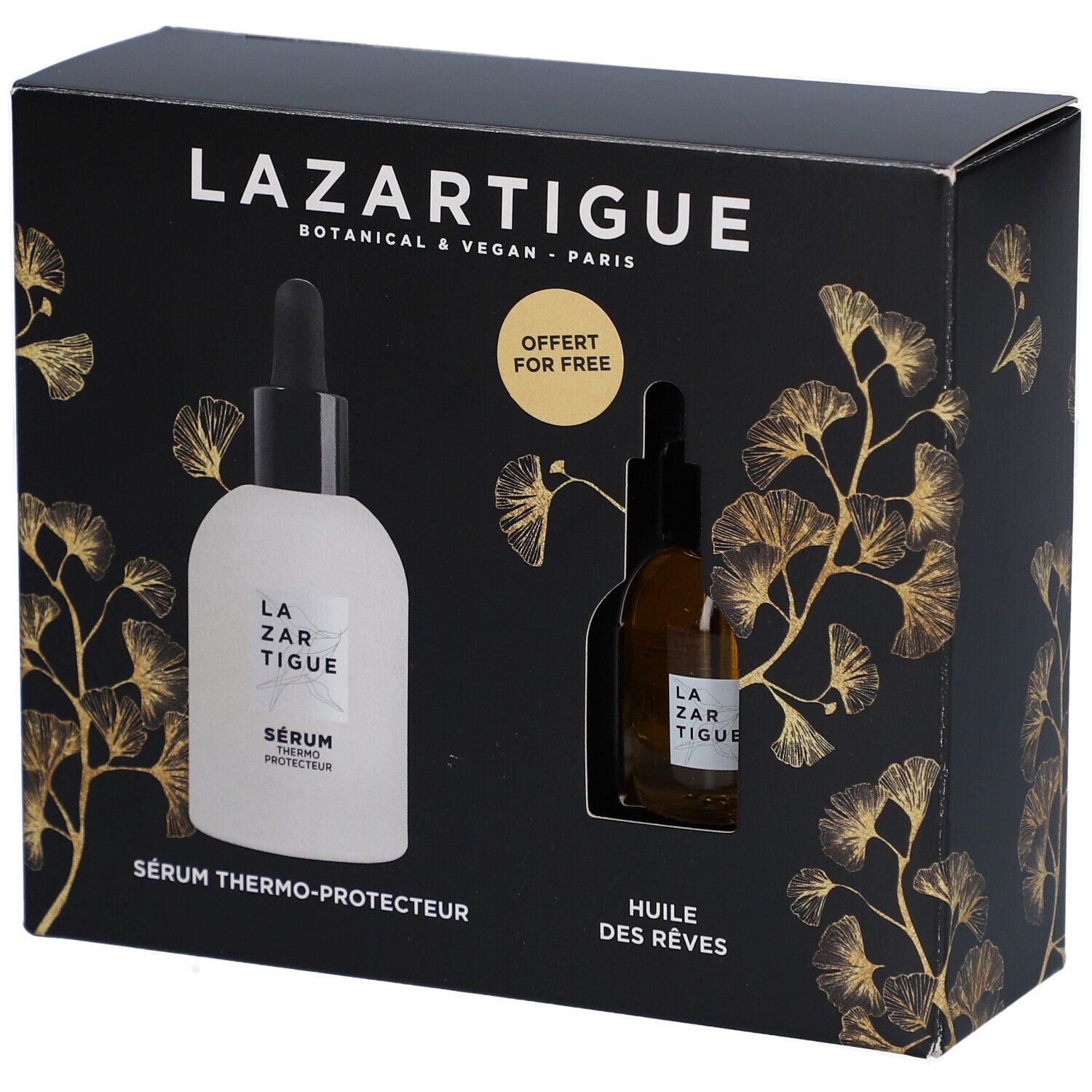 Coffret noir avec deux flacons. Inscription LAZARTIGUE. Un flacon blanc, un marron. Texte: SÉRUM THERMO-PROTECTEUR, HUILE DES RÊVES. Offert pour free.