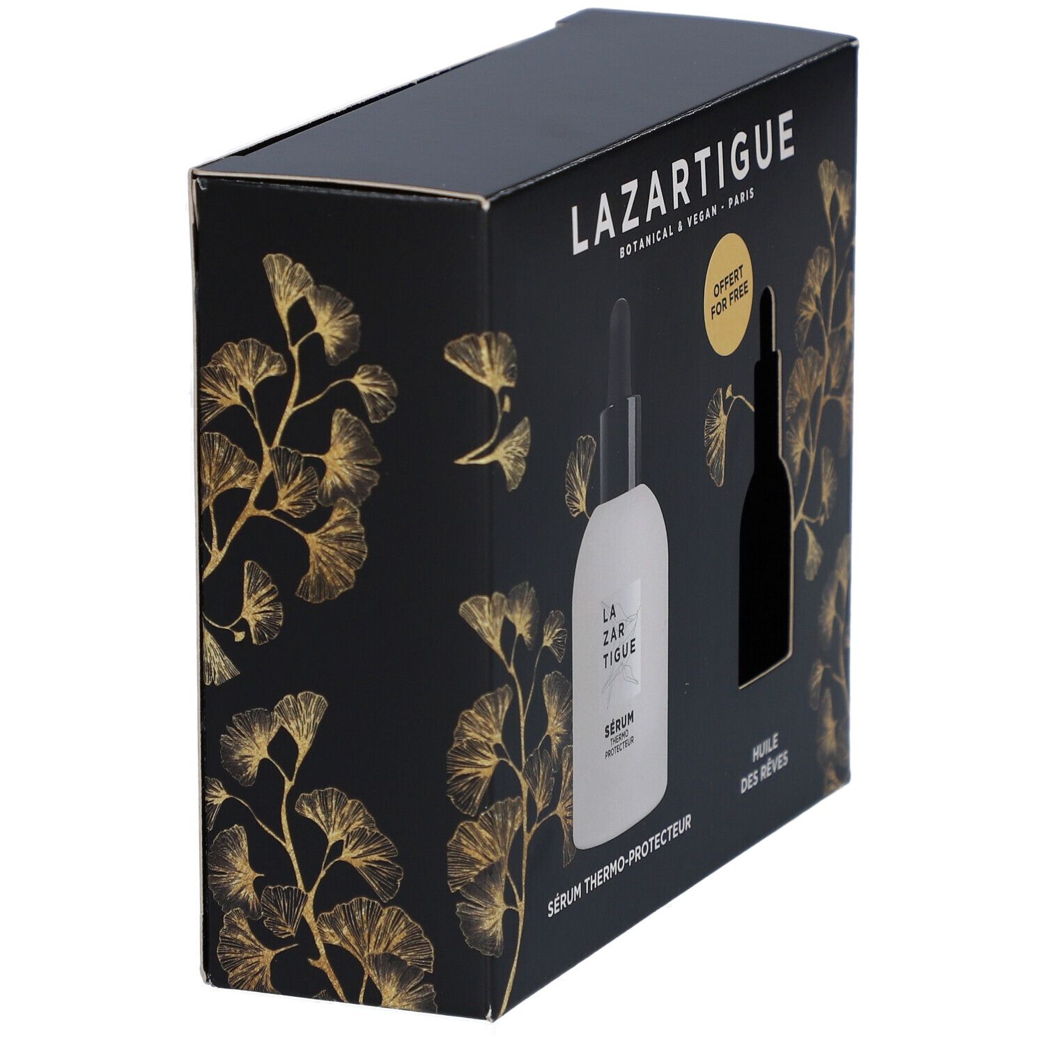 Coffret noir avec deux flacons. Inscription LAZARTIGUE. Un flacon blanc, un marron. Texte: SÉRUM THERMO-PROTECTEUR, HUILE DES RÊVES. Offert pour free.